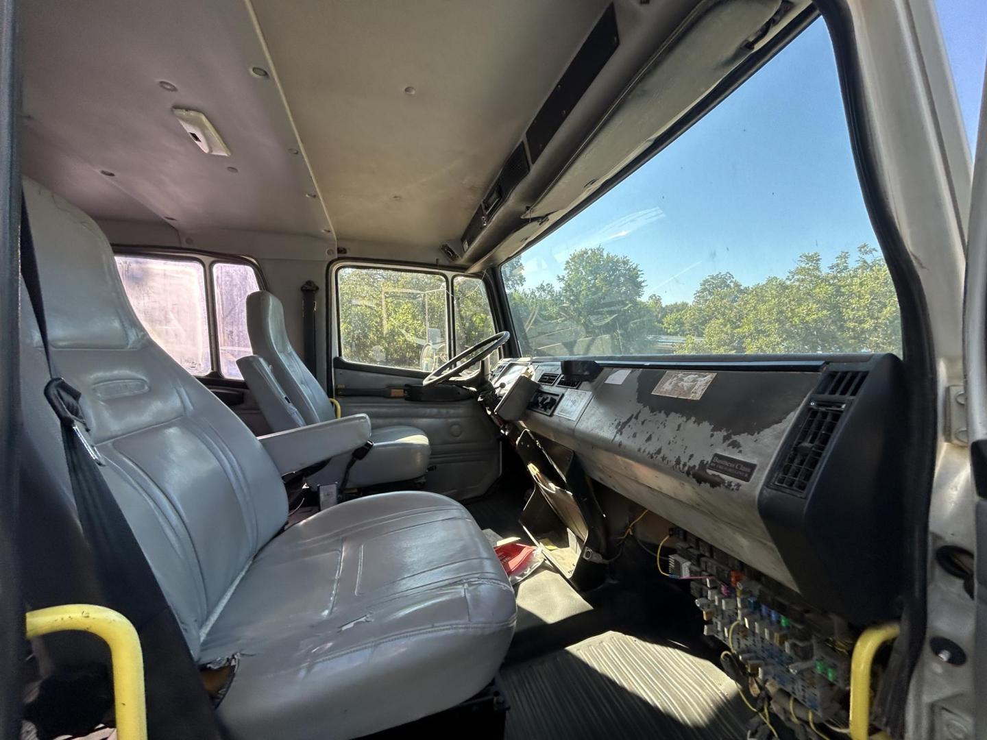 2002 White Freightliner FL70 - (1FVABTBS52D) with an 8.3L L6 DIESEL engine, located at 1687 Business 35 S, New Braunfels, TX, 78130, (830) 625-7159, 29.655487, -98.051491 - Photo#2