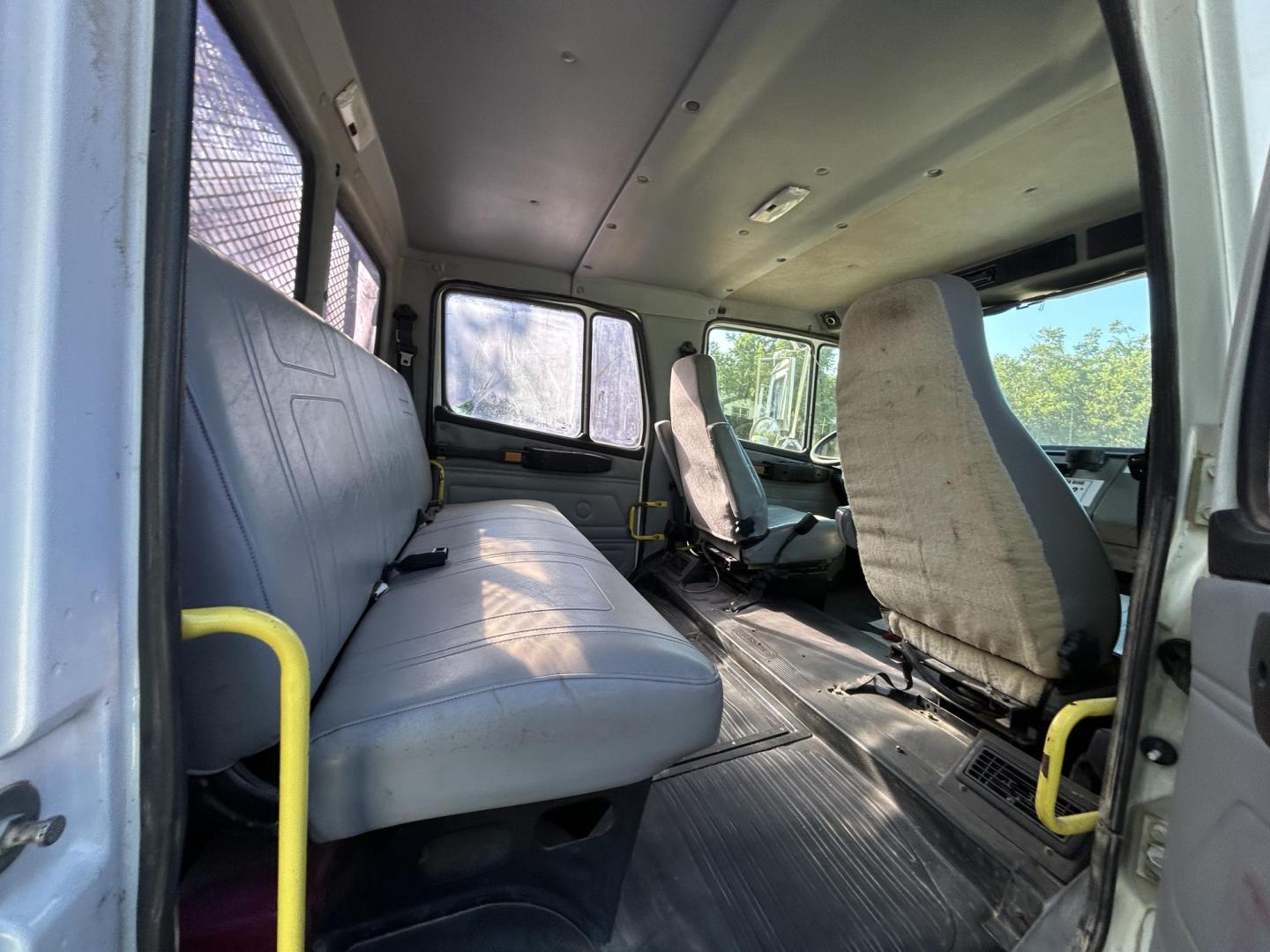 2002 White Freightliner FL70 - (1FVABTBS52D) with an 8.3L L6 DIESEL engine, located at 1687 Business 35 S, New Braunfels, TX, 78130, (830) 625-7159, 29.655487, -98.051491 - Photo#4