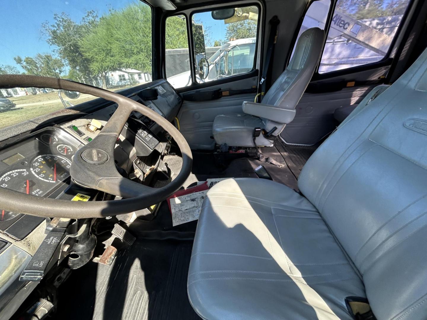 2002 White Freightliner FL70 - (1FVABTBS52D) with an 8.3L L6 DIESEL engine, located at 1687 Business 35 S, New Braunfels, TX, 78130, (830) 625-7159, 29.655487, -98.051491 - Photo#9