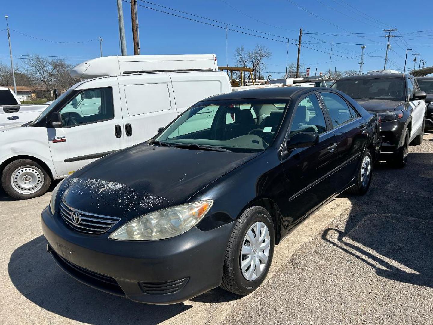 2005 Black /Gray Toyota Camry LE (4T1BE32K65U) with an 2.4L L4 DOHC 16V engine, located at 1687 Business 35 S, New Braunfels, TX, 78130, (830) 625-7159, 29.655487, -98.051491 - Photo#0