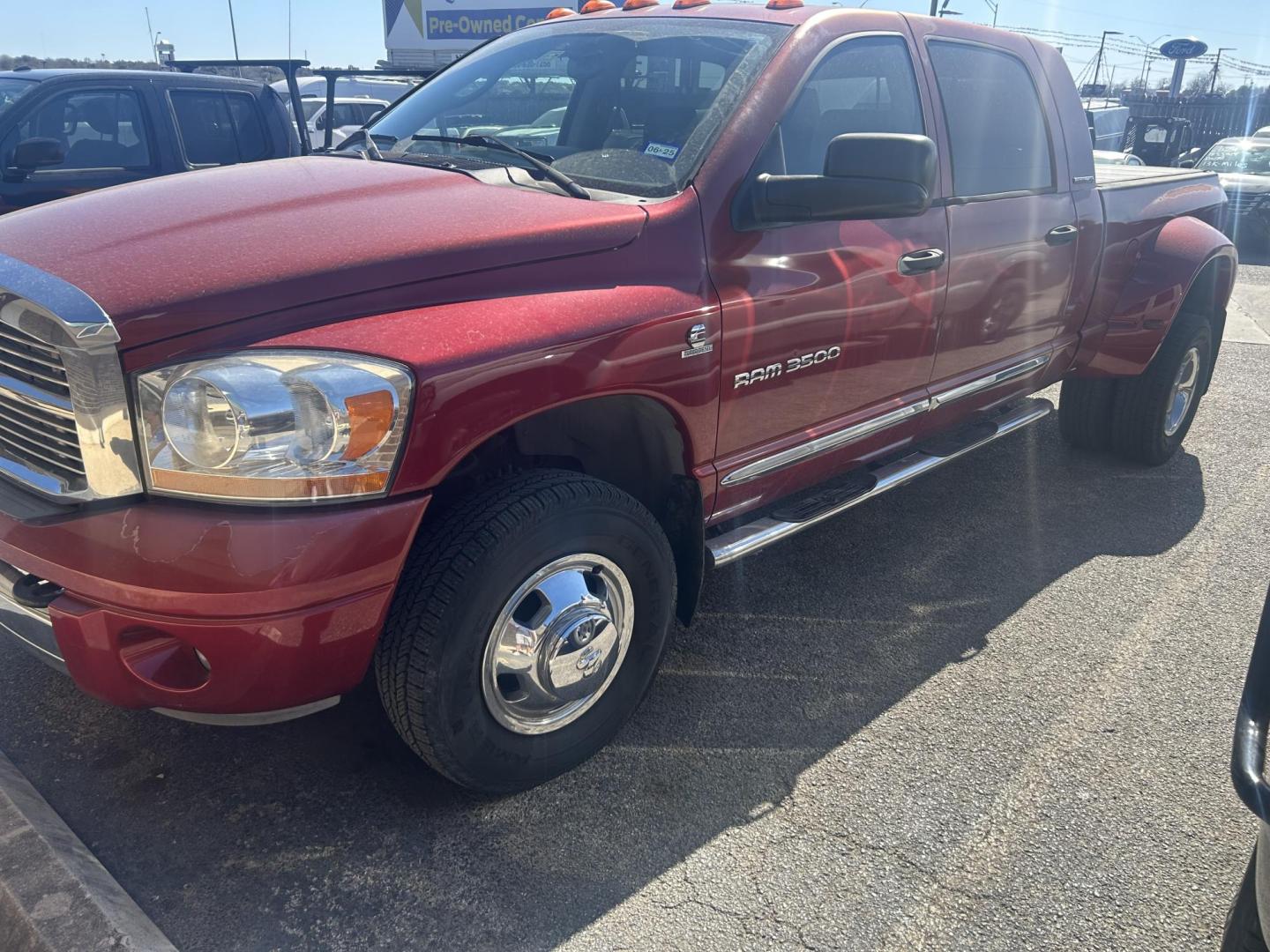 2006 Red Dodge Ram 3500 Laramie Mega Cab 4WD DRW (3D3MX49C66G) with an 5.9L L6 OHV 24V TURBO DIESEL engine, located at 1687 Business 35 S, New Braunfels, TX, 78130, (830) 625-7159, 29.655487, -98.051491 - Photo#0