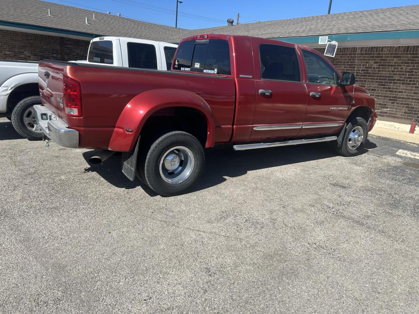 2006 Red Dodge Ram 3500 Laramie Mega Cab 4WD DRW (3D3MX49C66G) with an 5.9L L6 OHV 24V TURBO DIESEL engine, located at 1687 Business 35 S, New Braunfels, TX, 78130, (830) 625-7159, 29.655487, -98.051491 - Photo#2