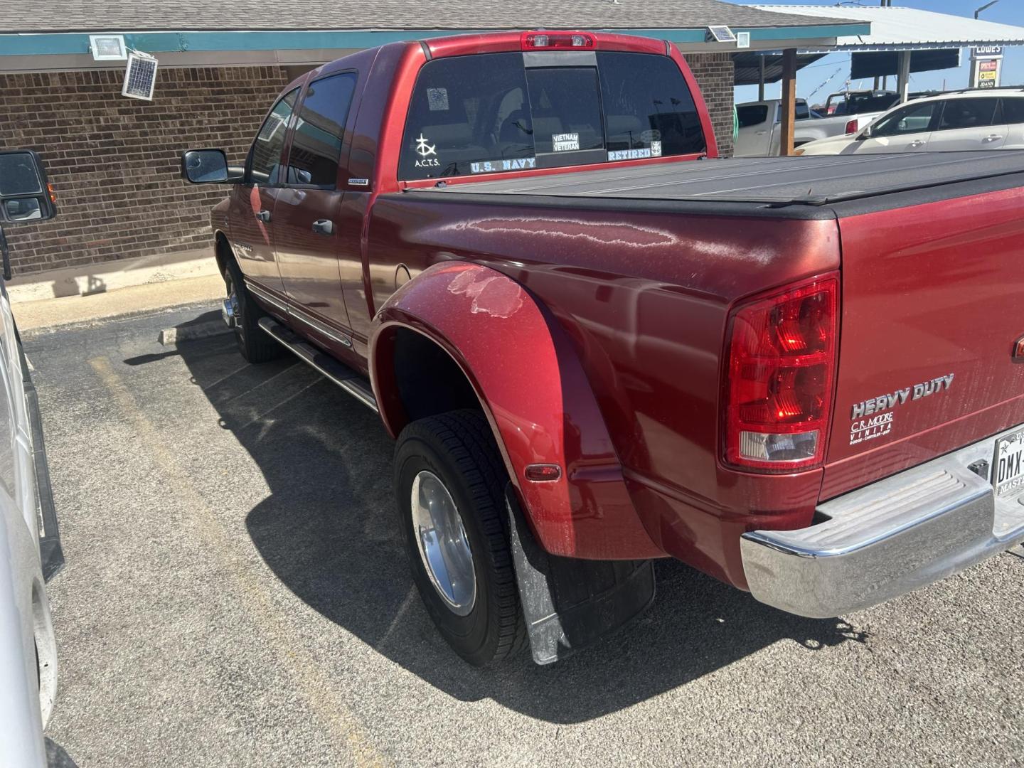2006 Red Dodge Ram 3500 Laramie Mega Cab 4WD DRW (3D3MX49C66G) with an 5.9L L6 OHV 24V TURBO DIESEL engine, located at 1687 Business 35 S, New Braunfels, TX, 78130, (830) 625-7159, 29.655487, -98.051491 - Photo#1