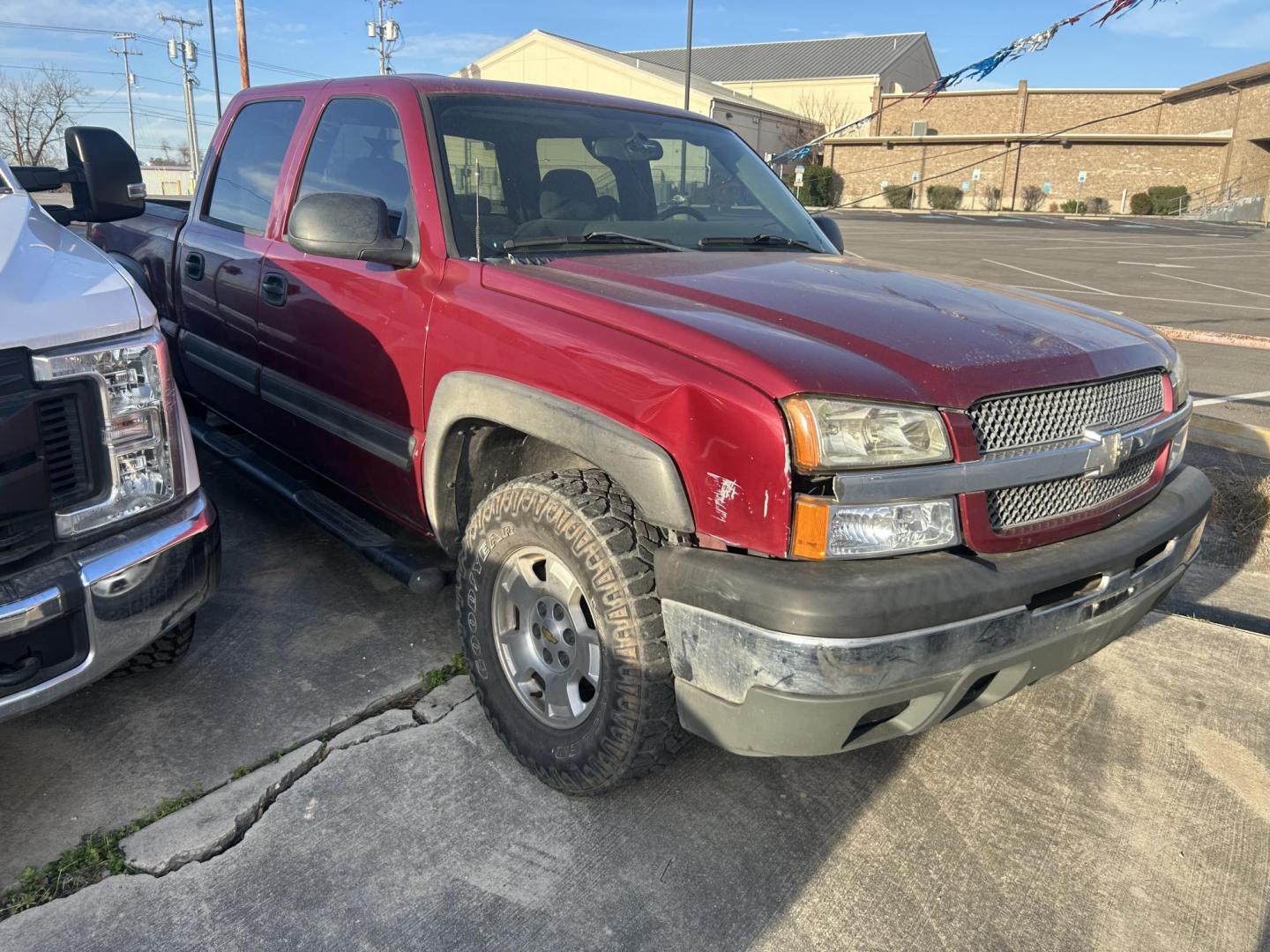 2005 Red Chevrolet Silverado 1500 LS Crew Cab 4WD (2GCEK13T851) with an 5.3L V8 OHV 16V engine, 4-Speed Automatic Overdrive transmission, located at 1687 Business 35 S, New Braunfels, TX, 78130, (830) 625-7159, 29.655487, -98.051491 - Photo#3
