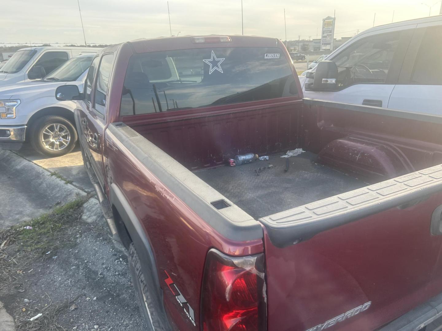2005 Red Chevrolet Silverado 1500 LS Crew Cab 4WD (2GCEK13T851) with an 5.3L V8 OHV 16V engine, 4-Speed Automatic Overdrive transmission, located at 1687 Business 35 S, New Braunfels, TX, 78130, (830) 625-7159, 29.655487, -98.051491 - Photo#6