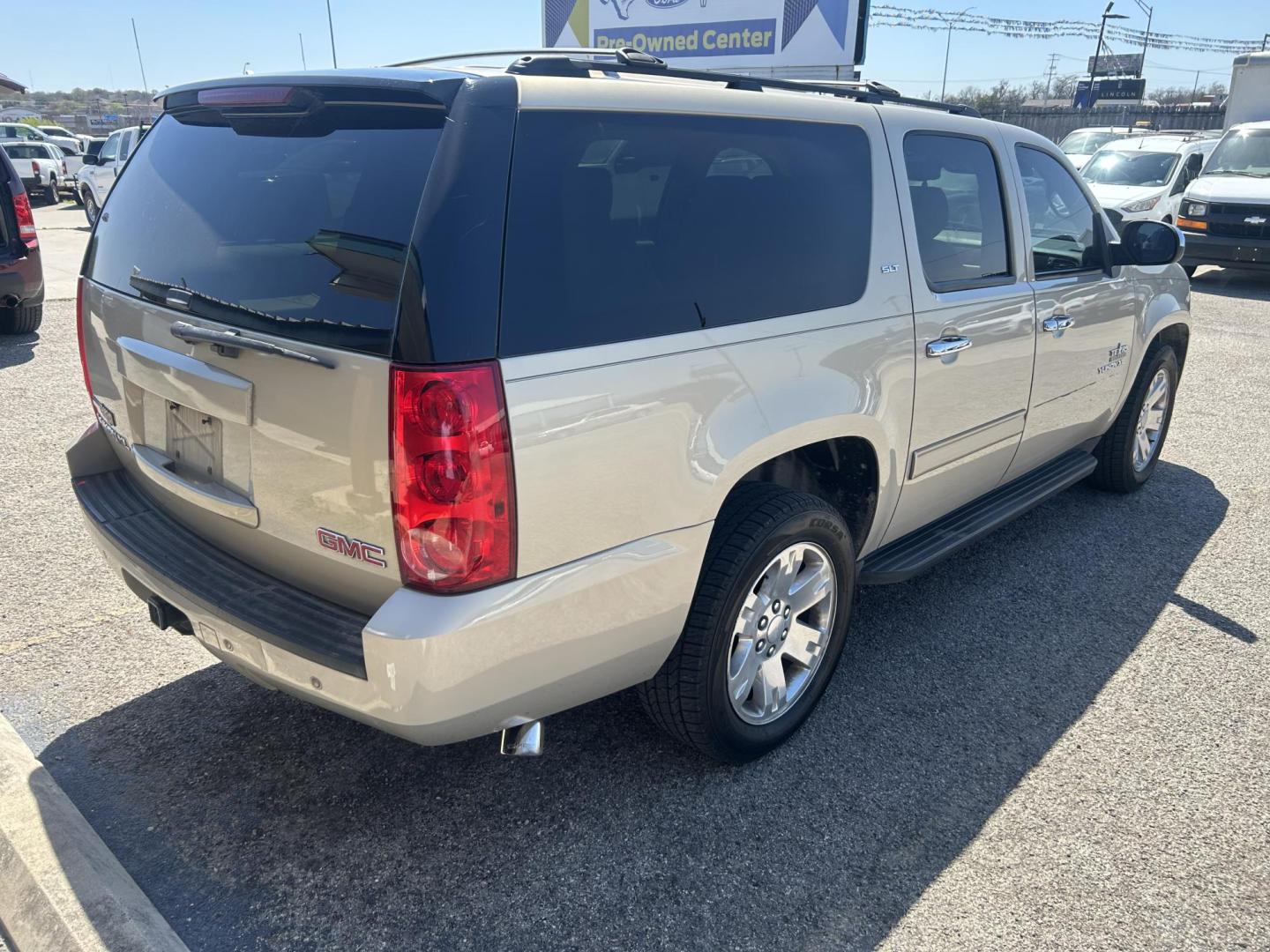 2012 Tan GMC Yukon XL SLT-1 1/2 Ton 2WD (1GKS1KE07CR) with an 5.3L V8 OHV 16V FFV engine, 6-Speed Automatic transmission, located at 1687 Business 35 S, New Braunfels, TX, 78130, (830) 625-7159, 29.655487, -98.051491 - Photo#1