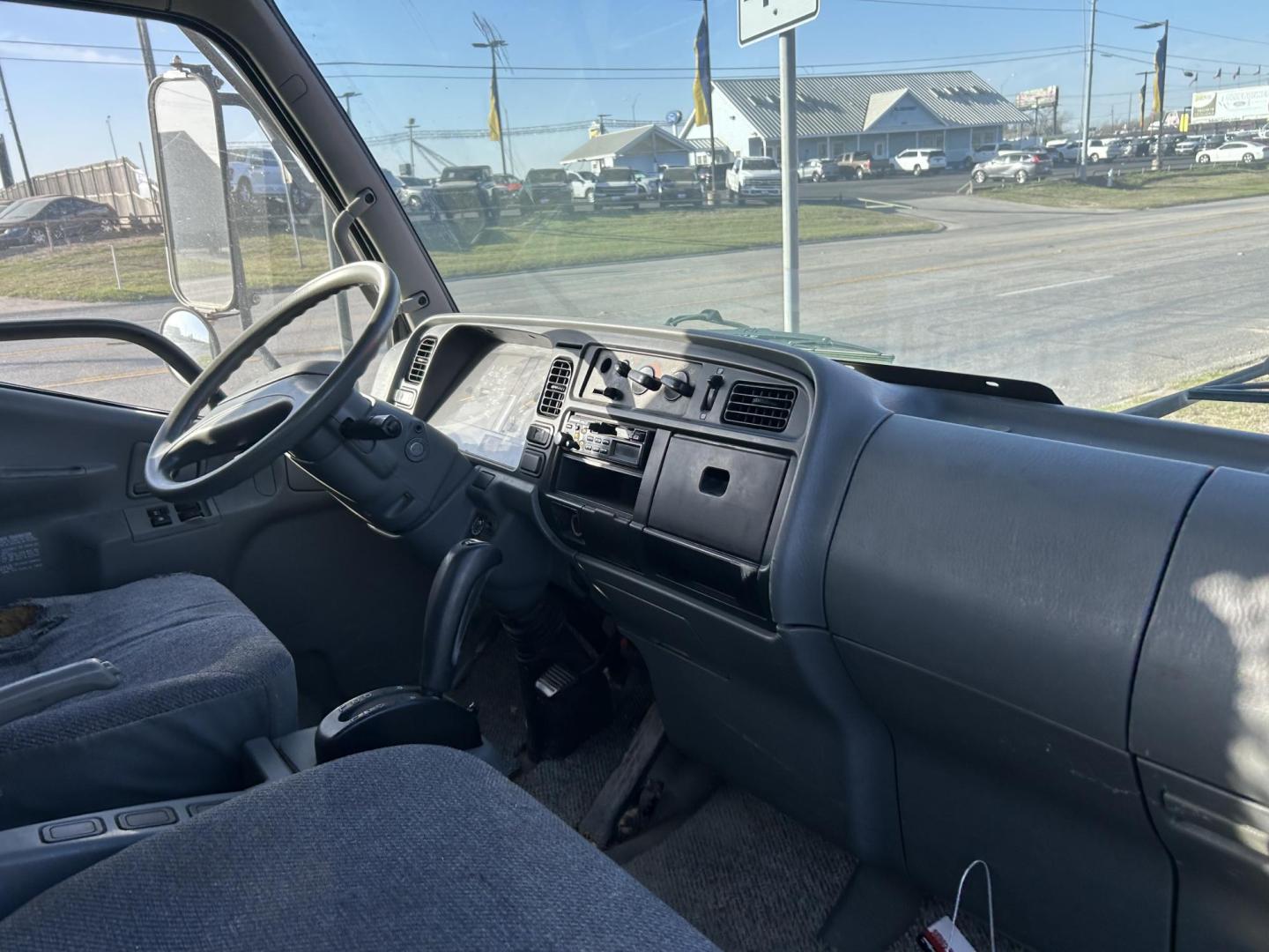 2004 White Mitsubishi Fuso FH210 - (JL6CPE1S54K) with an 4.9L L4 TURBO DIESEL engine, located at 1687 Business 35 S, New Braunfels, TX, 78130, (830) 625-7159, 29.655487, -98.051491 - Photo#3