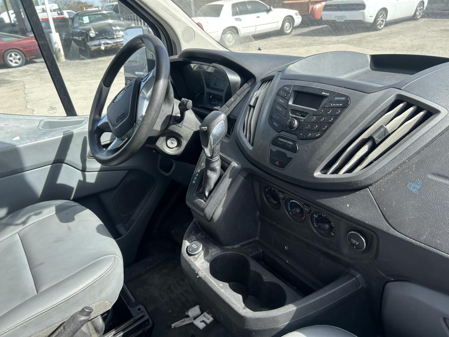 2018 White Ford Transit 150 Van Med. Roof w/Sliding Pass. 148-in. WB (1FTYE2CM4JK) with an 3.7L V6 DOHC 24V engine, 6A transmission, located at 1687 Business 35 S, New Braunfels, TX, 78130, (830) 625-7159, 29.655487, -98.051491 - Photo#5