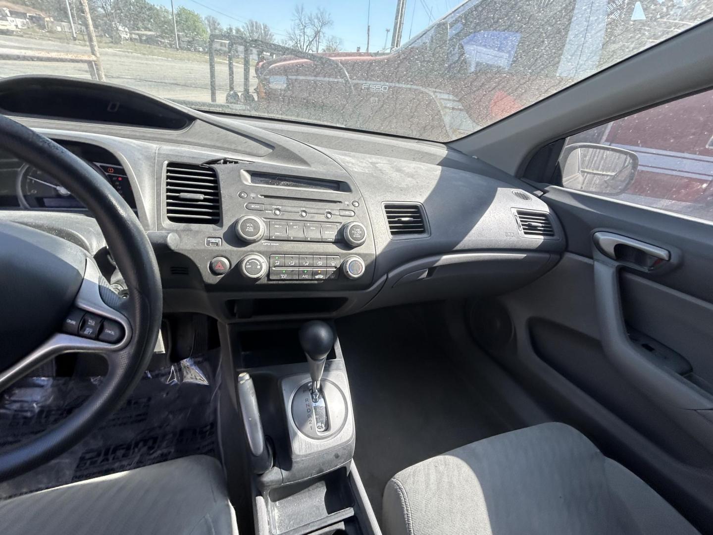 2009 Blue Honda Civic LX Coupe 5-Speed AT (2HGFG12649H) with an 1.8L L4 SOHC 16V engine, 5-Speed Automatic transmission, located at 1687 Business 35 S, New Braunfels, TX, 78130, (830) 625-7159, 29.655487, -98.051491 - Photo#9