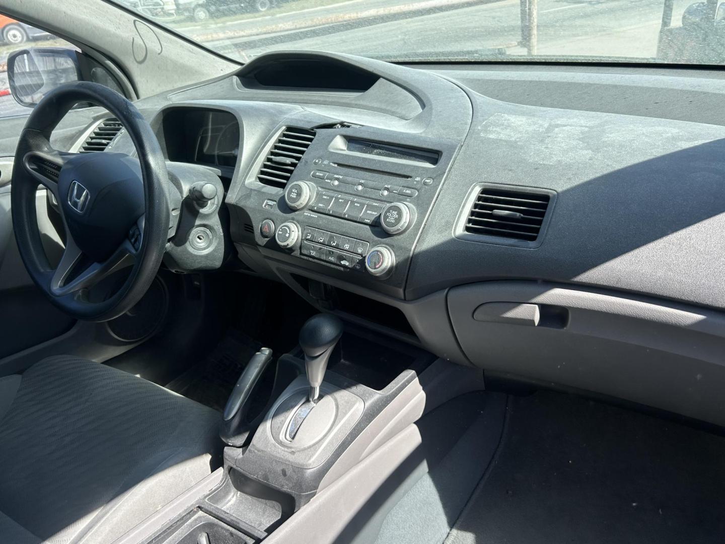 2009 Blue Honda Civic LX Coupe 5-Speed AT (2HGFG12649H) with an 1.8L L4 SOHC 16V engine, 5-Speed Automatic transmission, located at 1687 Business 35 S, New Braunfels, TX, 78130, (830) 625-7159, 29.655487, -98.051491 - Photo#4