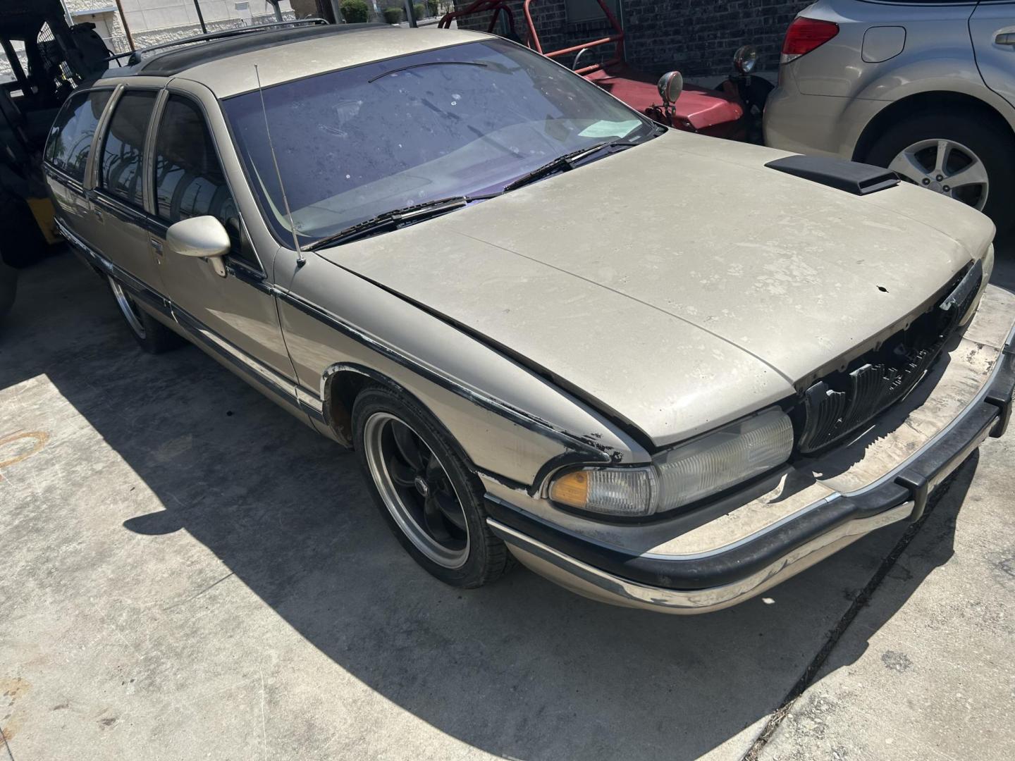 1994 Tan Buick Roadmaster Wagon Estate (1G4BR82P9RR) with an 5.7L V8 OHV 16V engine, 4-Speed Automatic Overdrive transmission, located at 1687 Business 35 S, New Braunfels, TX, 78130, (830) 625-7159, 29.655487, -98.051491 - Photo#2