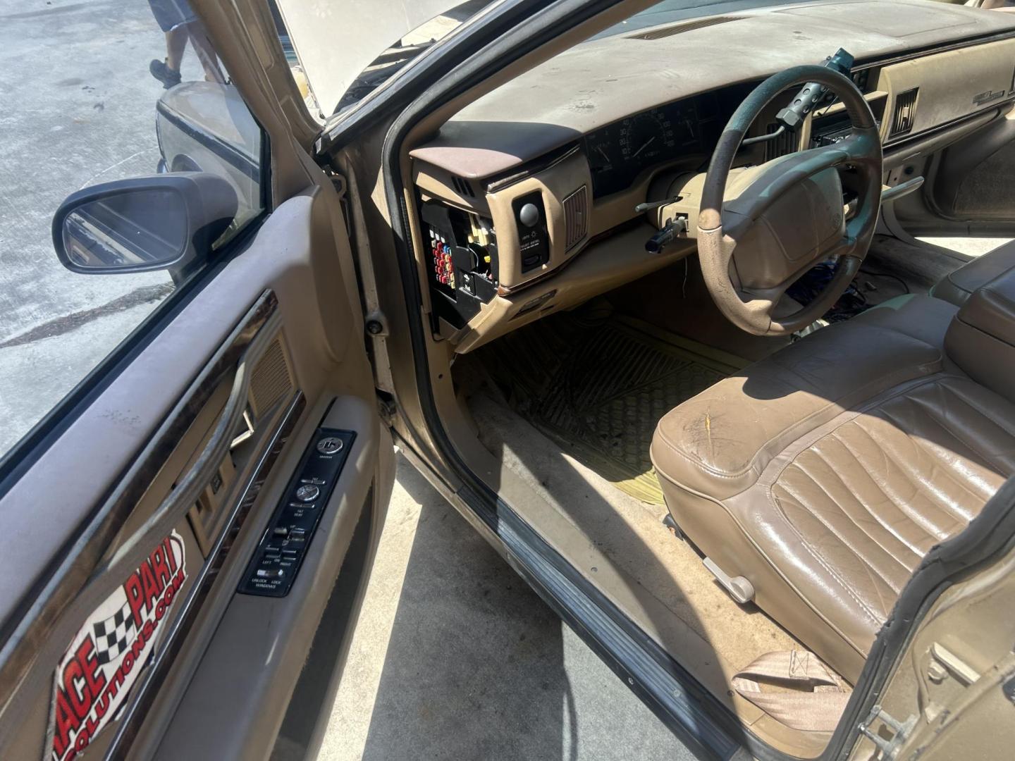 1994 Tan Buick Roadmaster Wagon Estate (1G4BR82P9RR) with an 5.7L V8 OHV 16V engine, 4-Speed Automatic Overdrive transmission, located at 1687 Business 35 S, New Braunfels, TX, 78130, (830) 625-7159, 29.655487, -98.051491 - Photo#7