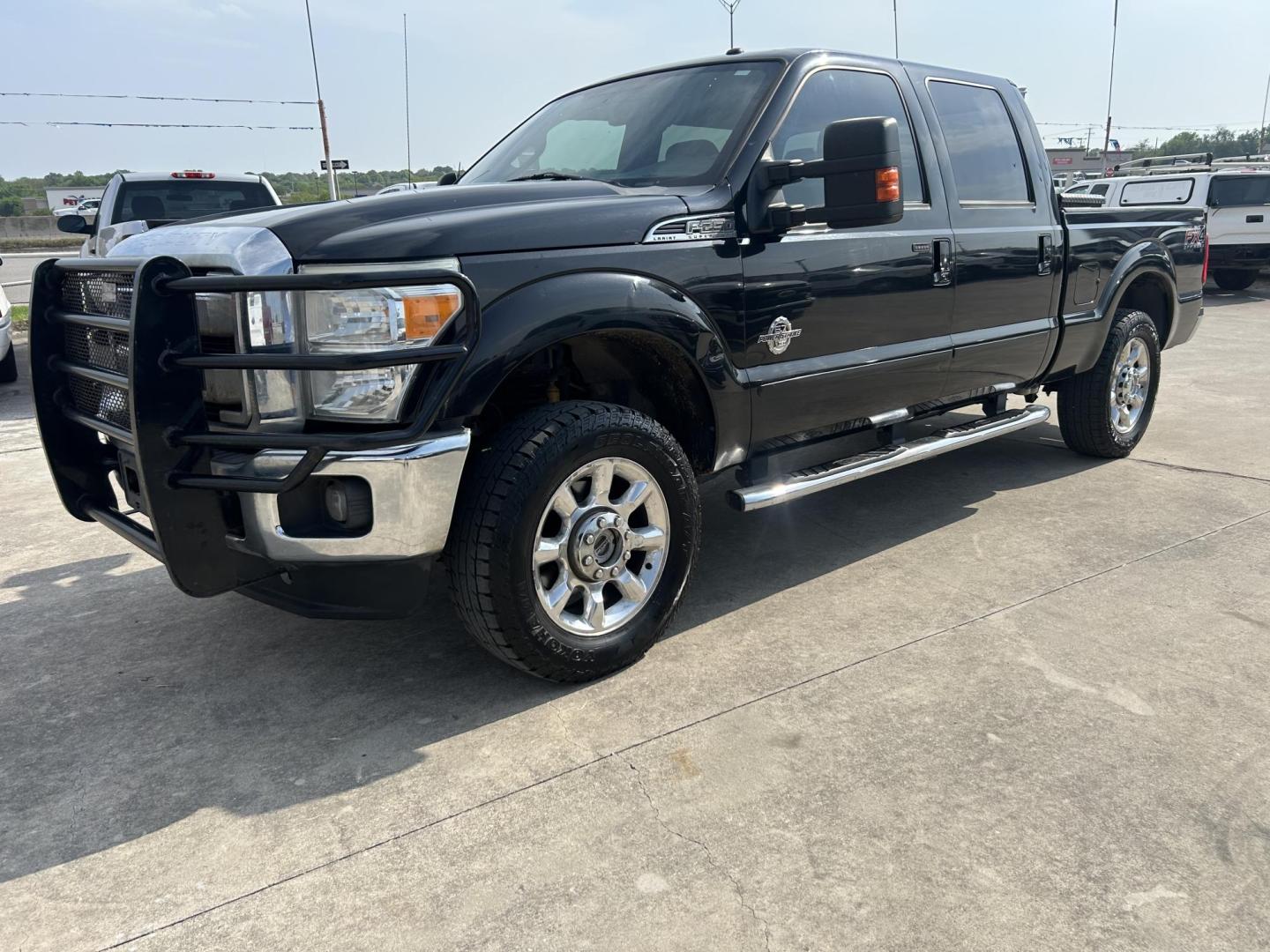 2015 Black Ford F-250 SD King Ranch Crew Cab 4WD (1FT7W2BT4FE) with an 6.7L V8 OHV 16V DIESEL engine, 6-Speed Automatic transmission, located at 1687 Business 35 S, New Braunfels, TX, 78130, (830) 625-7159, 29.655487, -98.051491 - Photo#0
