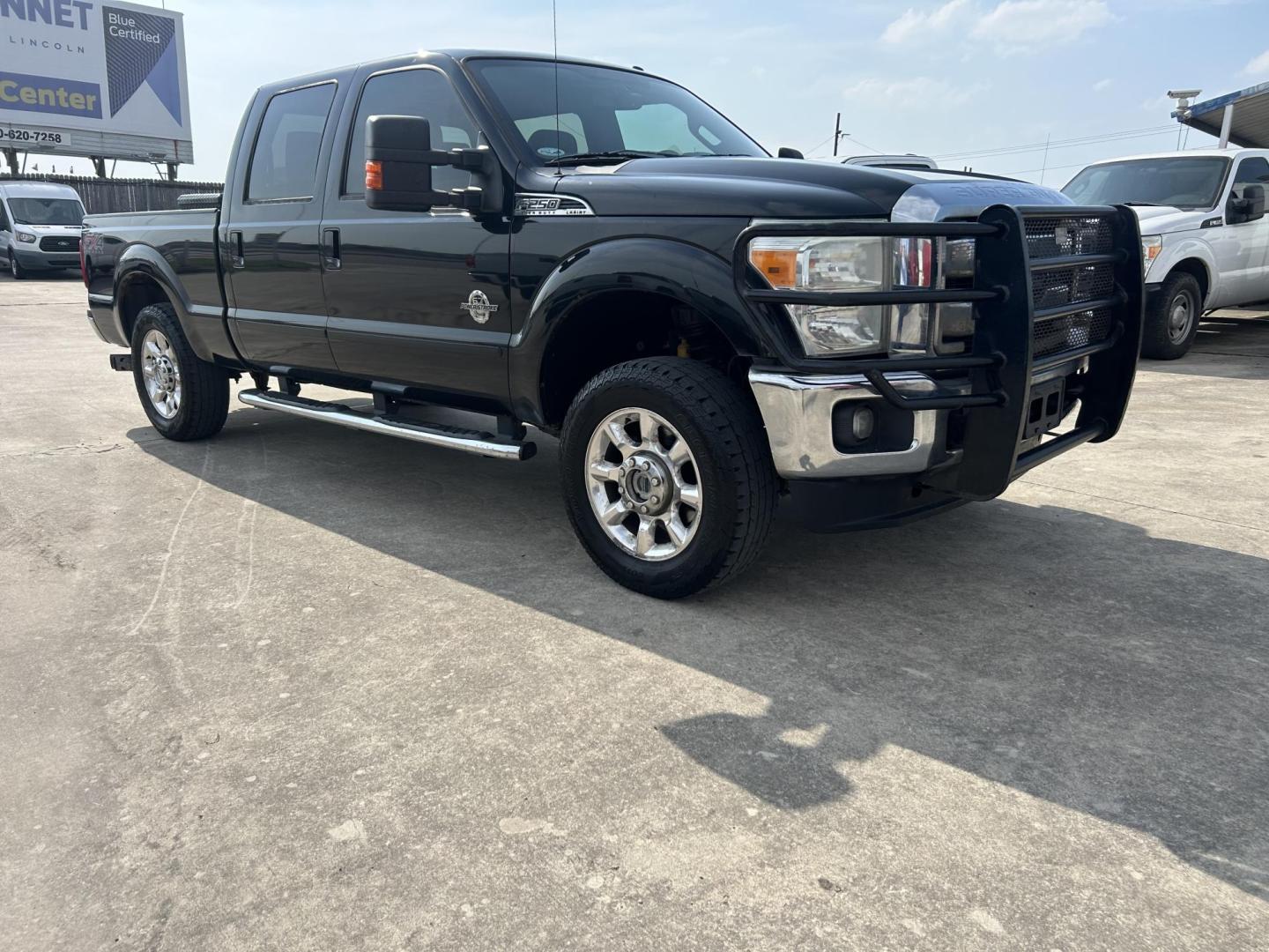 2015 Black Ford F-250 SD King Ranch Crew Cab 4WD (1FT7W2BT4FE) with an 6.7L V8 OHV 16V DIESEL engine, 6-Speed Automatic transmission, located at 1687 Business 35 S, New Braunfels, TX, 78130, (830) 625-7159, 29.655487, -98.051491 - Photo#4