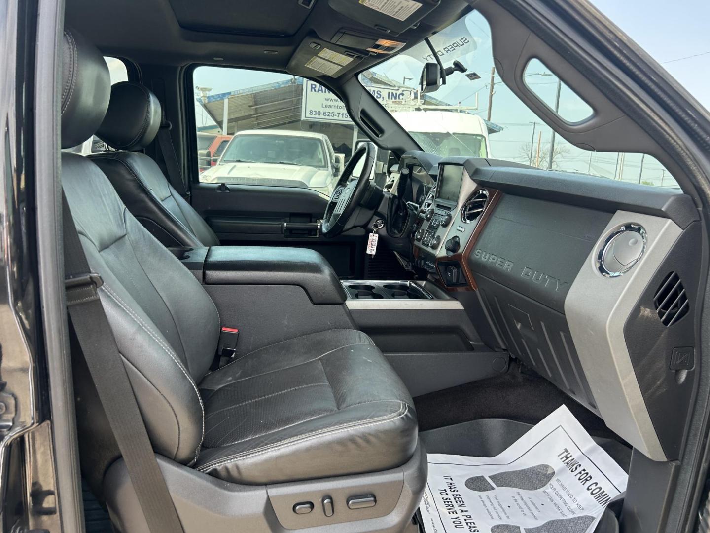 2015 Black Ford F-250 SD King Ranch Crew Cab 4WD (1FT7W2BT4FE) with an 6.7L V8 OHV 16V DIESEL engine, 6-Speed Automatic transmission, located at 1687 Business 35 S, New Braunfels, TX, 78130, (830) 625-7159, 29.655487, -98.051491 - Photo#7