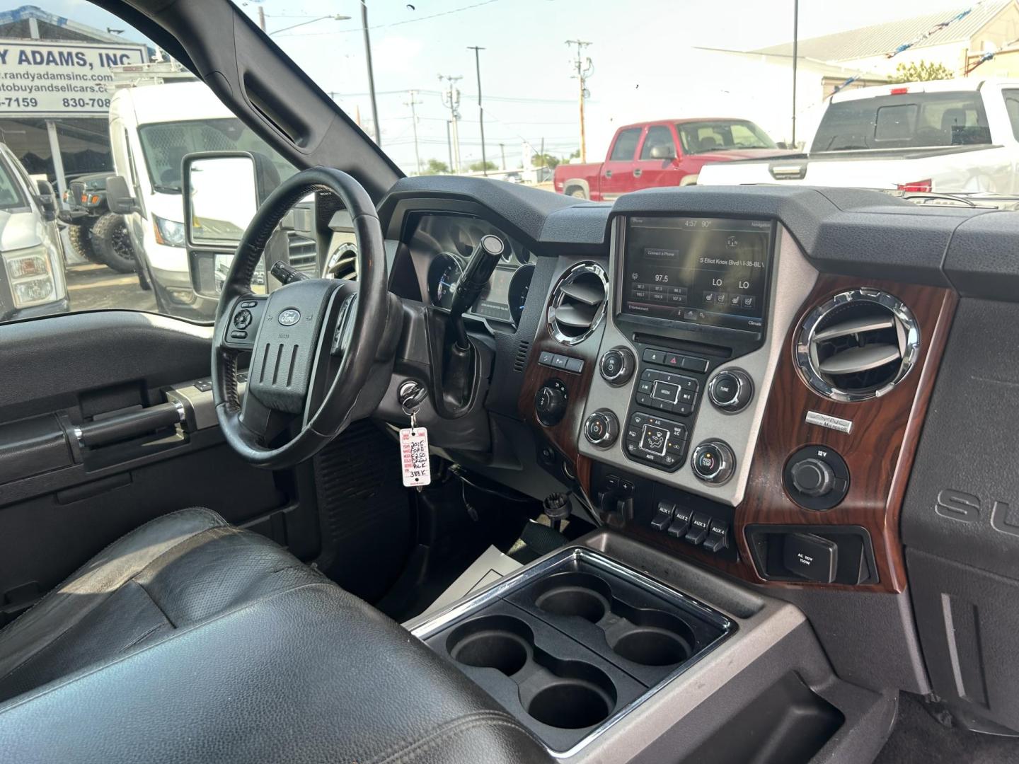 2015 Black Ford F-250 SD King Ranch Crew Cab 4WD (1FT7W2BT4FE) with an 6.7L V8 OHV 16V DIESEL engine, 6-Speed Automatic transmission, located at 1687 Business 35 S, New Braunfels, TX, 78130, (830) 625-7159, 29.655487, -98.051491 - Photo#10