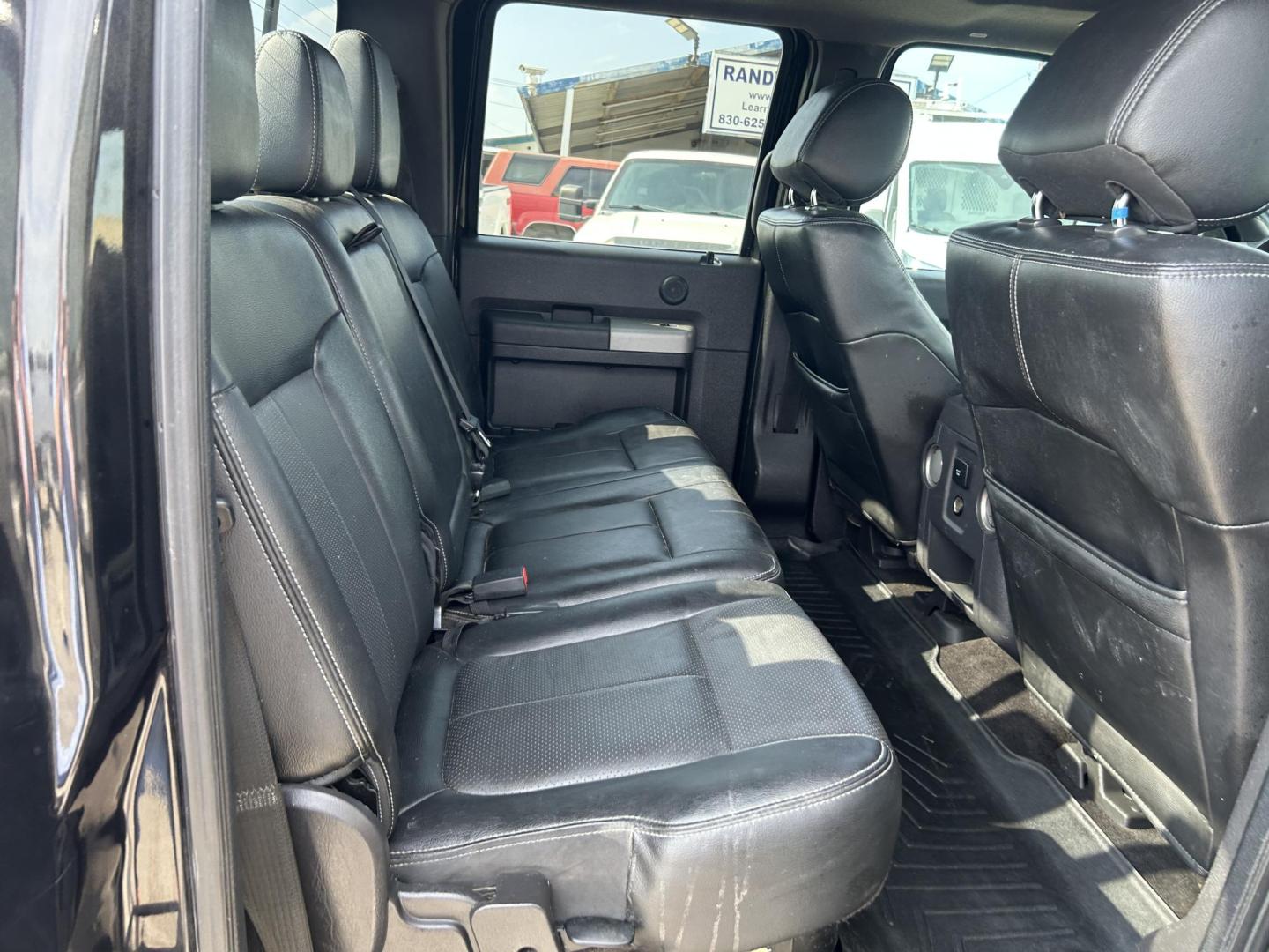 2015 Black Ford F-250 SD King Ranch Crew Cab 4WD (1FT7W2BT4FE) with an 6.7L V8 OHV 16V DIESEL engine, 6-Speed Automatic transmission, located at 1687 Business 35 S, New Braunfels, TX, 78130, (830) 625-7159, 29.655487, -98.051491 - Photo#8