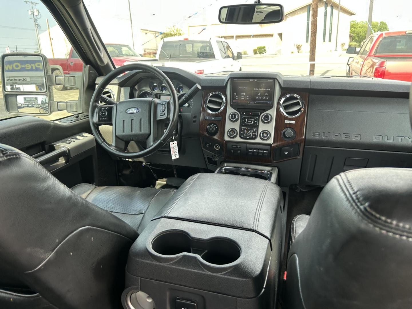 2015 Black Ford F-250 SD King Ranch Crew Cab 4WD (1FT7W2BT4FE) with an 6.7L V8 OHV 16V DIESEL engine, 6-Speed Automatic transmission, located at 1687 Business 35 S, New Braunfels, TX, 78130, (830) 625-7159, 29.655487, -98.051491 - Photo#11
