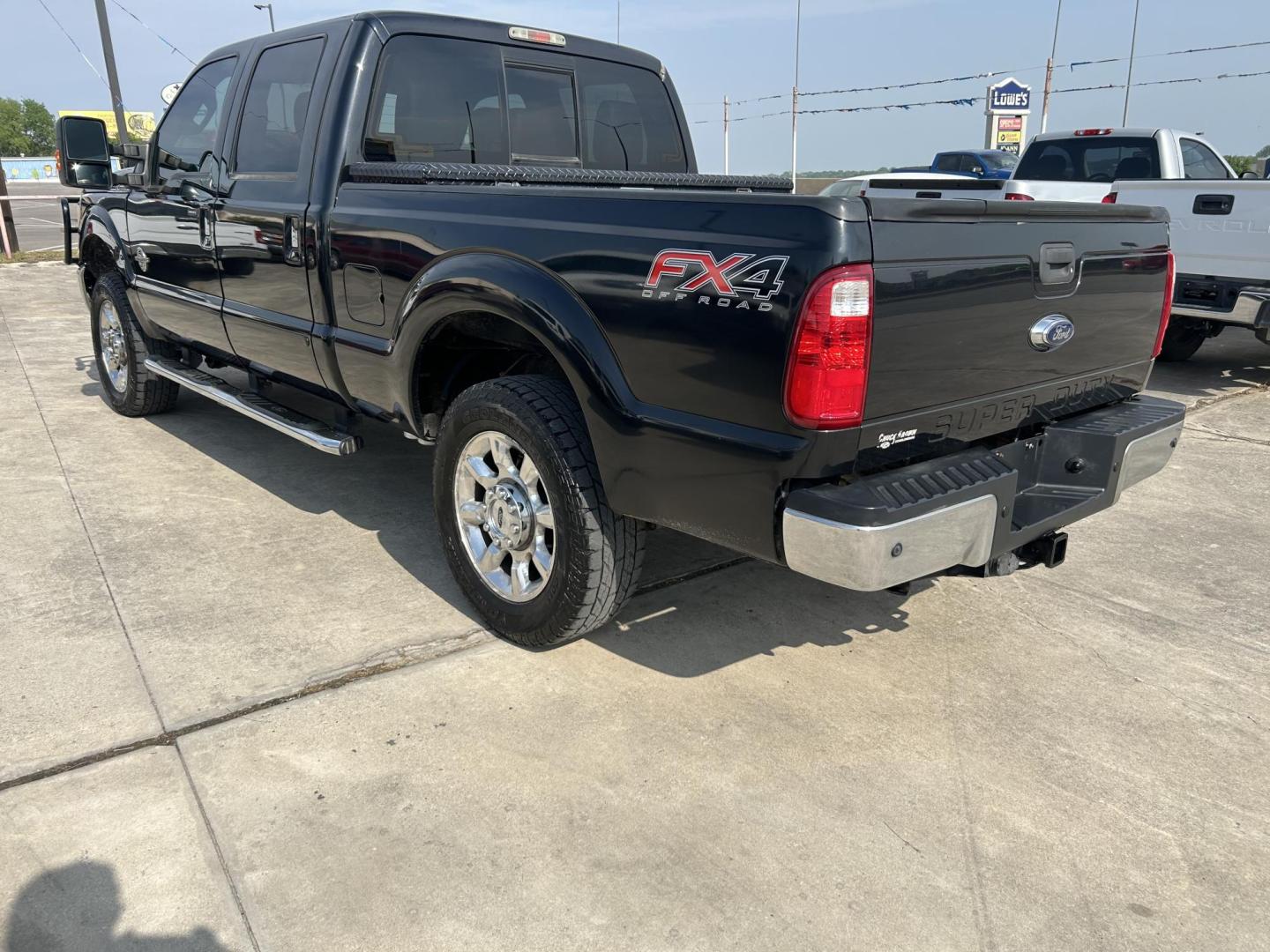 2015 Black Ford F-250 SD King Ranch Crew Cab 4WD (1FT7W2BT4FE) with an 6.7L V8 OHV 16V DIESEL engine, 6-Speed Automatic transmission, located at 1687 Business 35 S, New Braunfels, TX, 78130, (830) 625-7159, 29.655487, -98.051491 - Photo#1