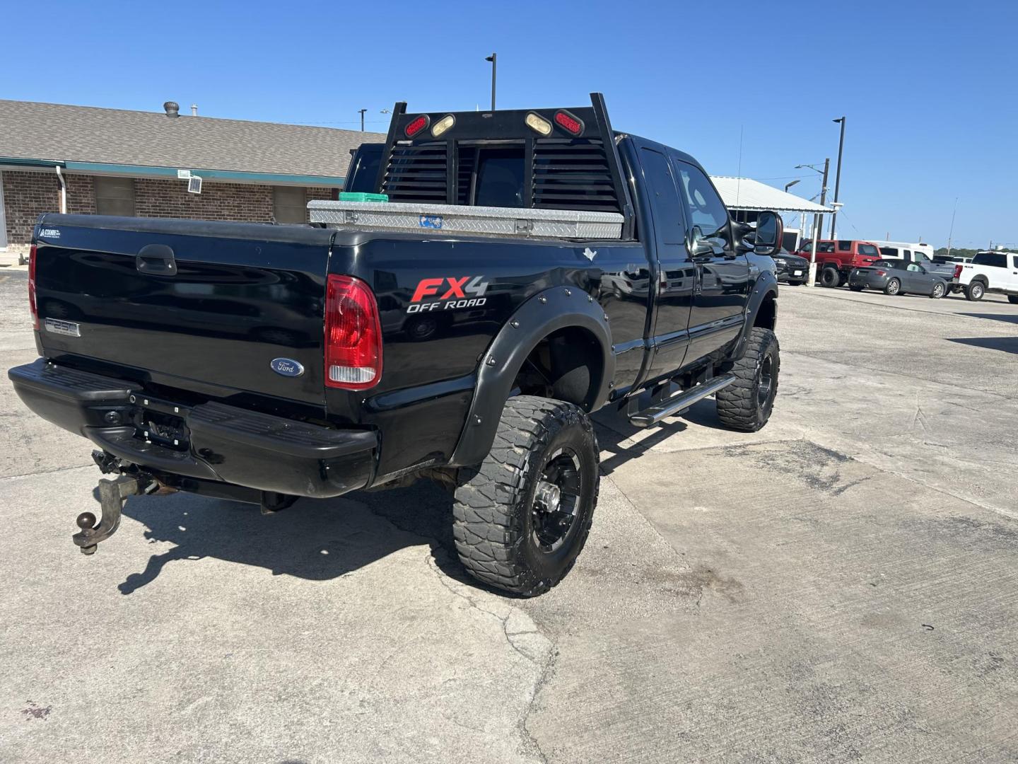 2005 Black Ford F-250 SD Lariat SuperCab 4WD (1FTSX21Y85E) with an 6.8L V10 SOHC 30V engine, located at 1687 Business 35 S, New Braunfels, TX, 78130, (830) 625-7159, 29.655487, -98.051491 - Photo#3
