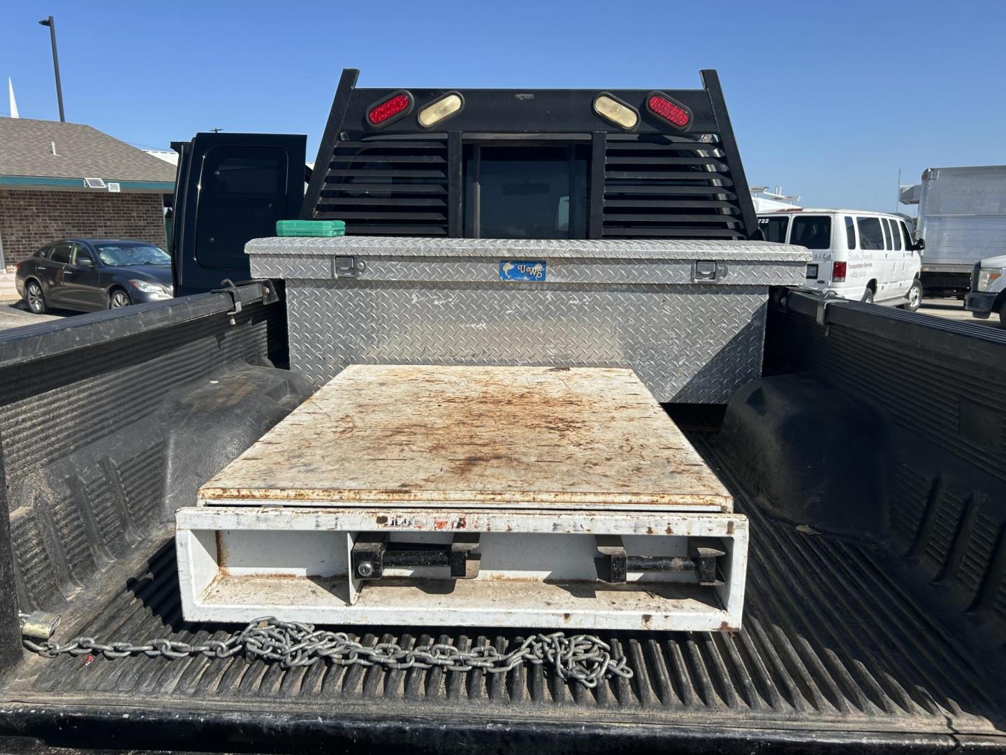 2005 Black Ford F-250 SD Lariat SuperCab 4WD (1FTSX21Y85E) with an 6.8L V10 SOHC 30V engine, located at 1687 Business 35 S, New Braunfels, TX, 78130, (830) 625-7159, 29.655487, -98.051491 - Photo#2