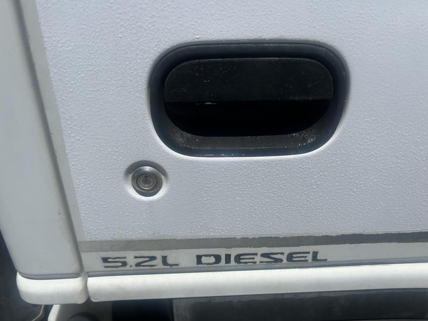 2007 White Isuzu NPR - (JALC4B16677) with an 5.2L L4 TURBO DIESEL engine, located at 1687 Business 35 S, New Braunfels, TX, 78130, (830) 625-7159, 29.655487, -98.051491 - Photo#1