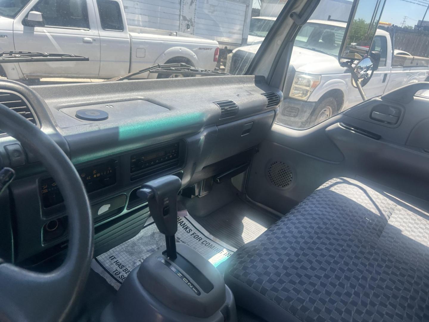 2007 White Isuzu NPR - (JALC4B16677) with an 5.2L L4 TURBO DIESEL engine, located at 1687 Business 35 S, New Braunfels, TX, 78130, (830) 625-7159, 29.655487, -98.051491 - Photo#15