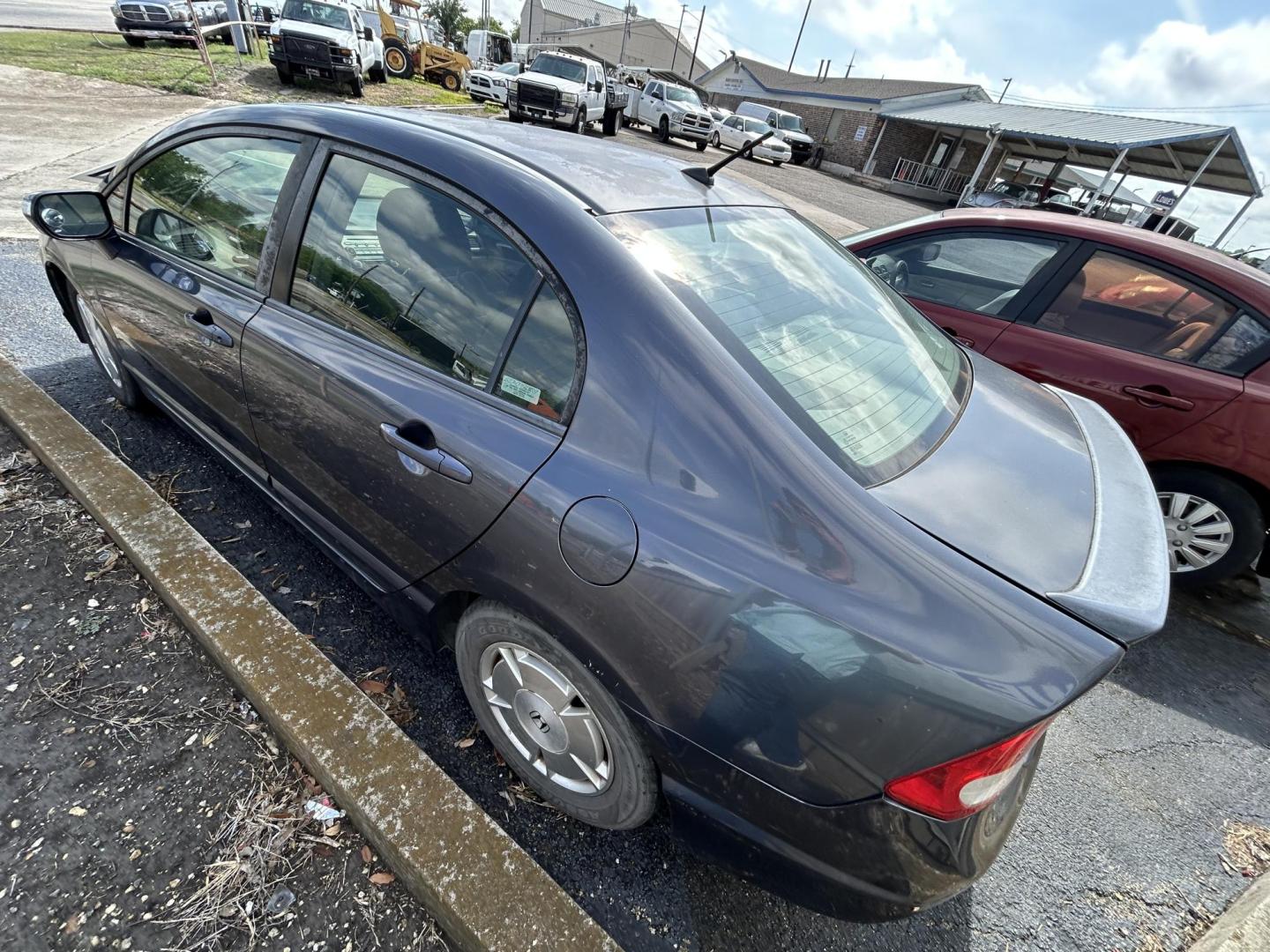 2009 Blue Honda Civic Hybrid CVT AT-PZEV (JHMFA36209S) with an 1.3L L4 SOHC 8V HYBRID engine, CVT transmission, located at 1687 Business 35 S, New Braunfels, TX, 78130, (830) 625-7159, 29.655487, -98.051491 - Photo#9