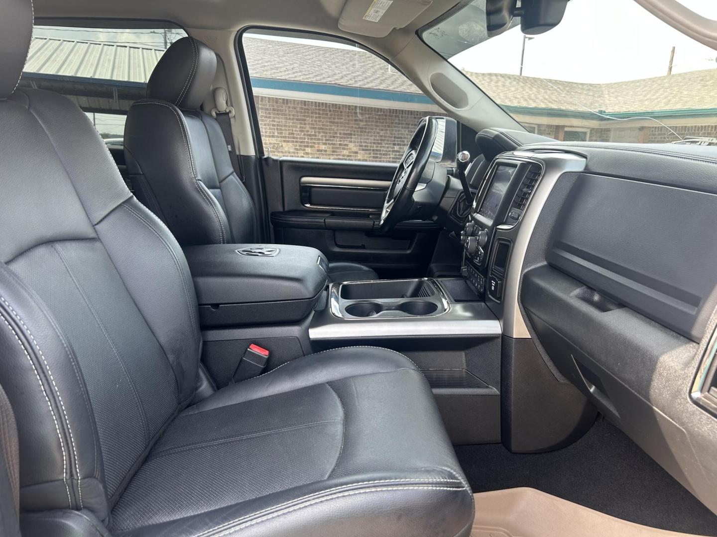 2018 Black RAM 2500 Laramie Crew Cab SWB 4WD (3C6UR5FL1JG) with an 6.7L L6 OHV 24V TURBO DIESEL engine, 6A transmission, located at 1687 Business 35 S, New Braunfels, TX, 78130, (830) 625-7159, 29.655487, -98.051491 - Photo#2