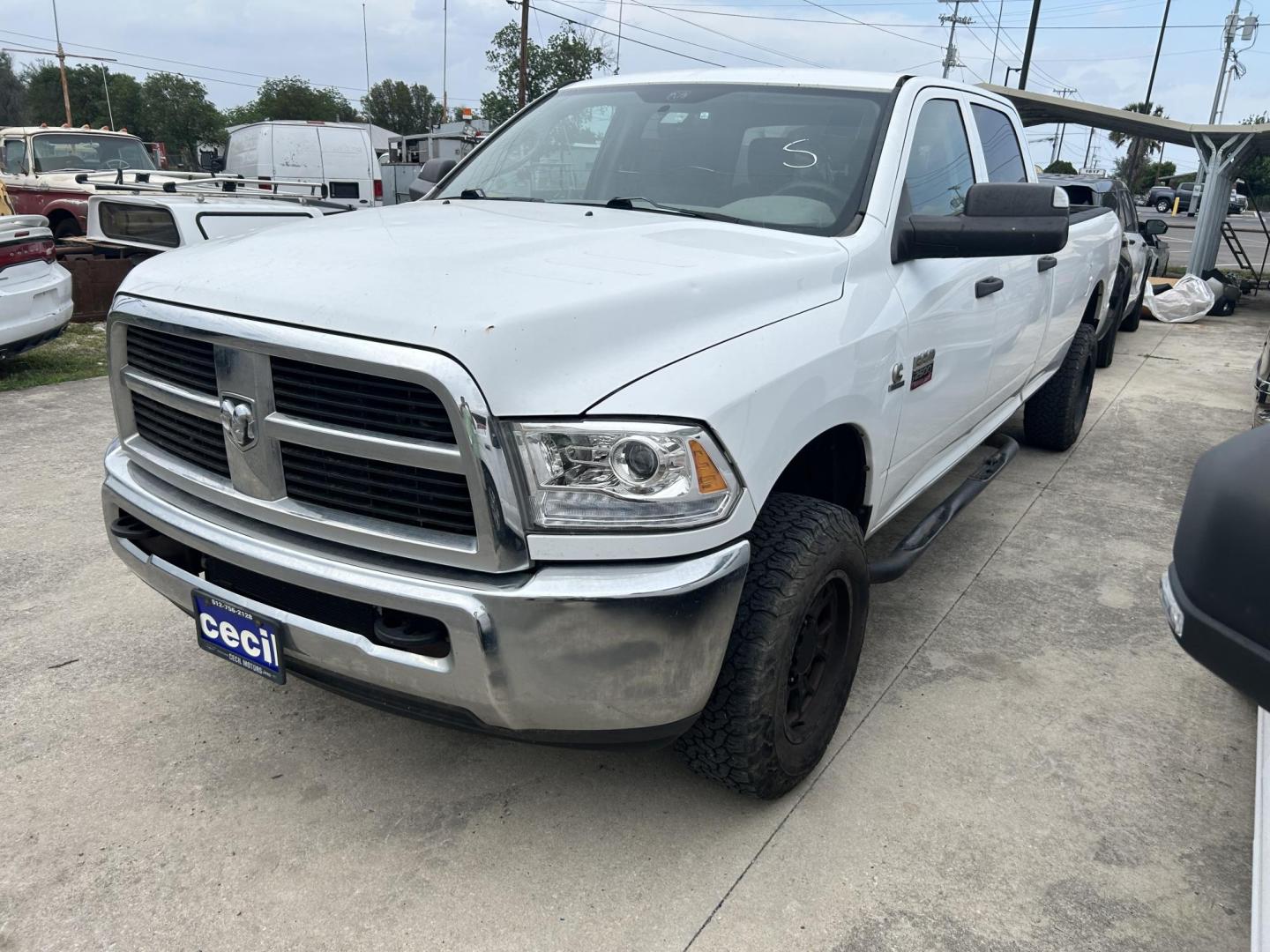 2011 White Dodge Ram 2500 Power Wagon Crew Cab 4WD (3D7UT2CL0BG) with an 6.7L L6 OHV 24V TURBO DIESEL engine, located at 1687 Business 35 S, New Braunfels, TX, 78130, (830) 625-7159, 29.655487, -98.051491 - Photo#0