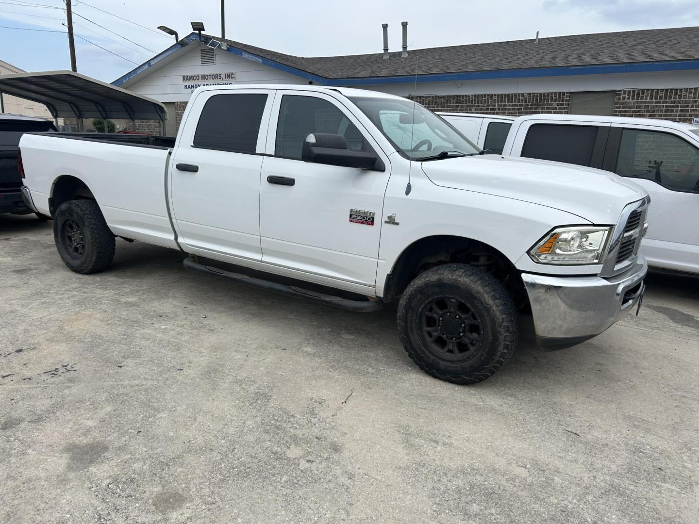 2011 White Dodge Ram 2500 Power Wagon Crew Cab 4WD (3D7UT2CL0BG) with an 6.7L L6 OHV 24V TURBO DIESEL engine, located at 1687 Business 35 S, New Braunfels, TX, 78130, (830) 625-7159, 29.655487, -98.051491 - Photo#1
