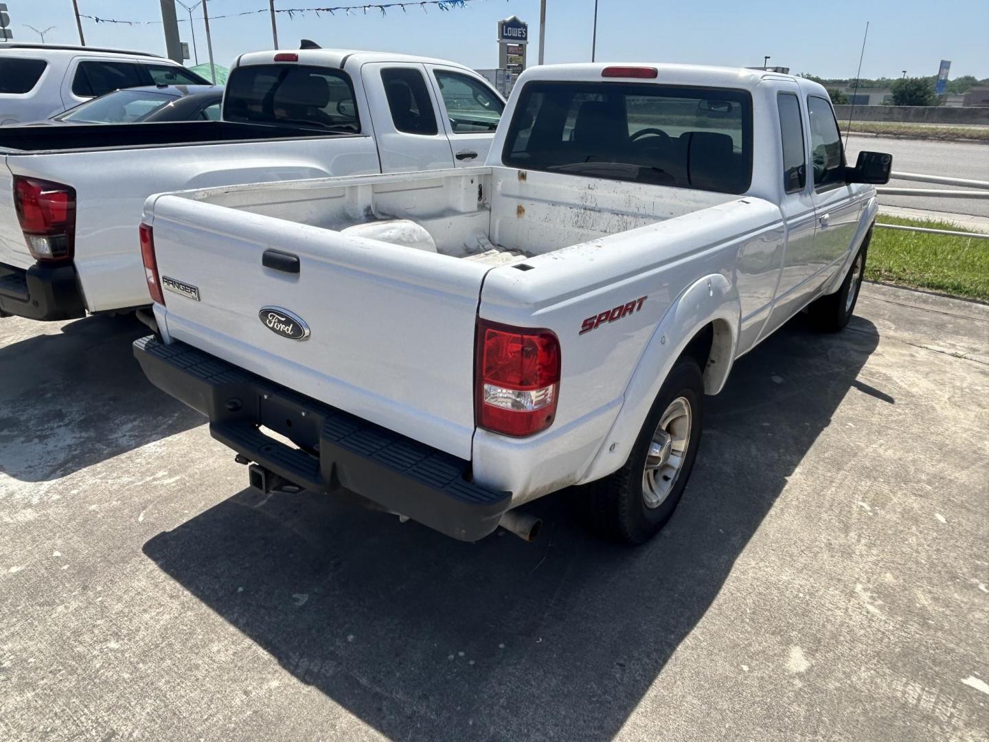 2011 White Ford Ranger Sport SuperCab 2WD (1FTKR1EE5BP) with an 4.0L V6 SOHC 12V engine, located at 1687 Business 35 S, New Braunfels, TX, 78130, (830) 625-7159, 29.655487, -98.051491 - Photo#4