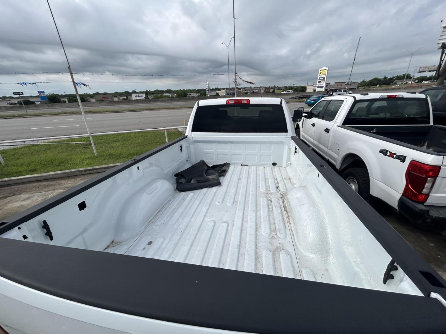 2020 White RAM 2500 Tradesman Crew Cab LWB 4WD (3C6UR5HL0LG) with an 6.7L L6 OHV 24V TURBO DIESEL engine, 6A transmission, located at 1687 Business 35 S, New Braunfels, TX, 78130, (830) 625-7159, 29.655487, -98.051491 - Photo#7