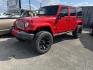2017 Red Jeep Wrangler Unlimited Sahara 4WD (1C4HJWEGXHL) with an 3.6L V6 DOHC 24V FFV engine, located at 1687 Business 35 S, New Braunfels, TX, 78130, (830) 625-7159, 29.655487, -98.051491 - Photo#0