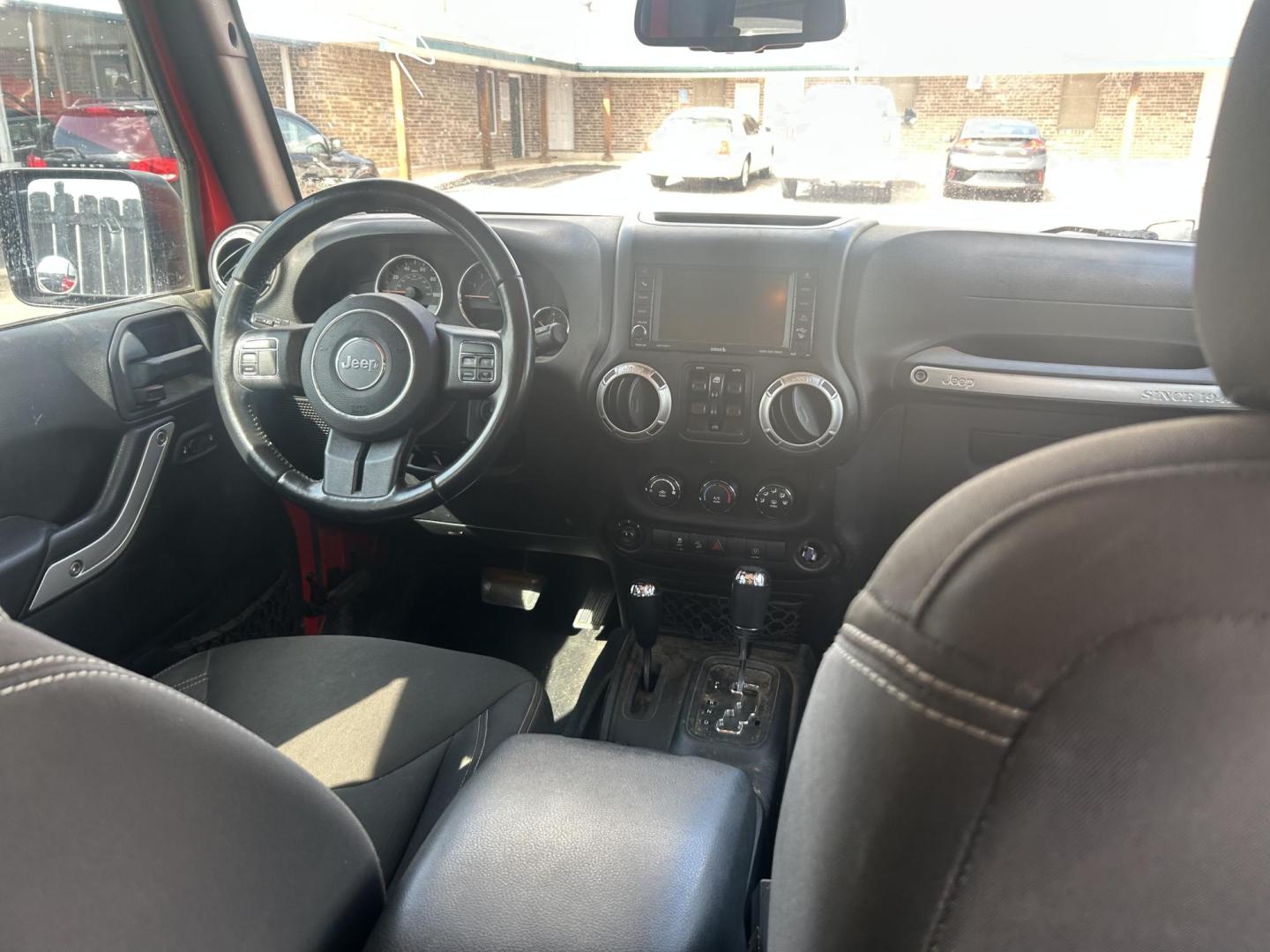 2017 Red Jeep Wrangler Unlimited Sahara 4WD (1C4HJWEGXHL) with an 3.6L V6 DOHC 24V FFV engine, located at 1687 Business 35 S, New Braunfels, TX, 78130, (830) 625-7159, 29.655487, -98.051491 - Photo#6