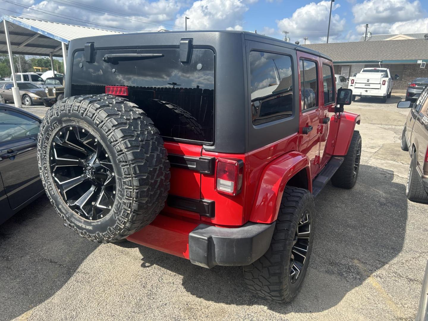 2017 Red Jeep Wrangler Unlimited Sahara 4WD (1C4HJWEGXHL) with an 3.6L V6 DOHC 24V FFV engine, located at 1687 Business 35 S, New Braunfels, TX, 78130, (830) 625-7159, 29.655487, -98.051491 - Photo#7