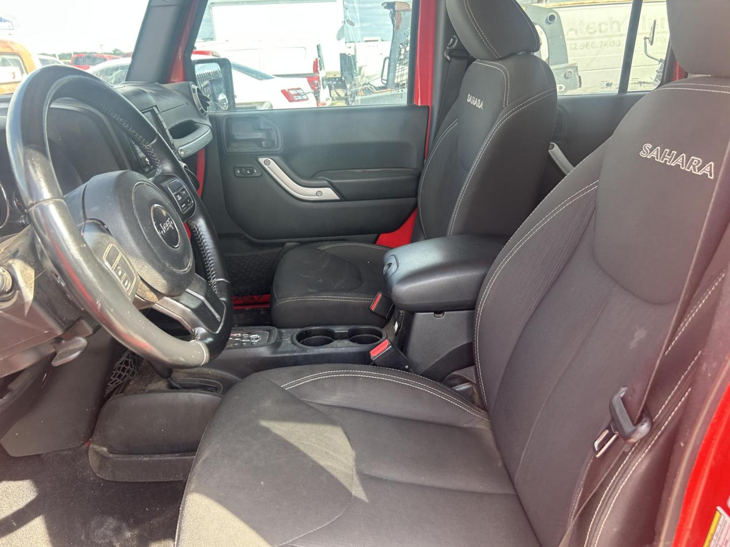 2017 Red Jeep Wrangler Unlimited Sahara 4WD (1C4HJWEGXHL) with an 3.6L V6 DOHC 24V FFV engine, located at 1687 Business 35 S, New Braunfels, TX, 78130, (830) 625-7159, 29.655487, -98.051491 - Photo#11