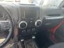 2017 Red Jeep Wrangler Unlimited Sahara 4WD (1C4HJWEGXHL) with an 3.6L V6 DOHC 24V FFV engine, located at 1687 Business 35 S, New Braunfels, TX, 78130, (830) 625-7159, 29.655487, -98.051491 - Photo#13