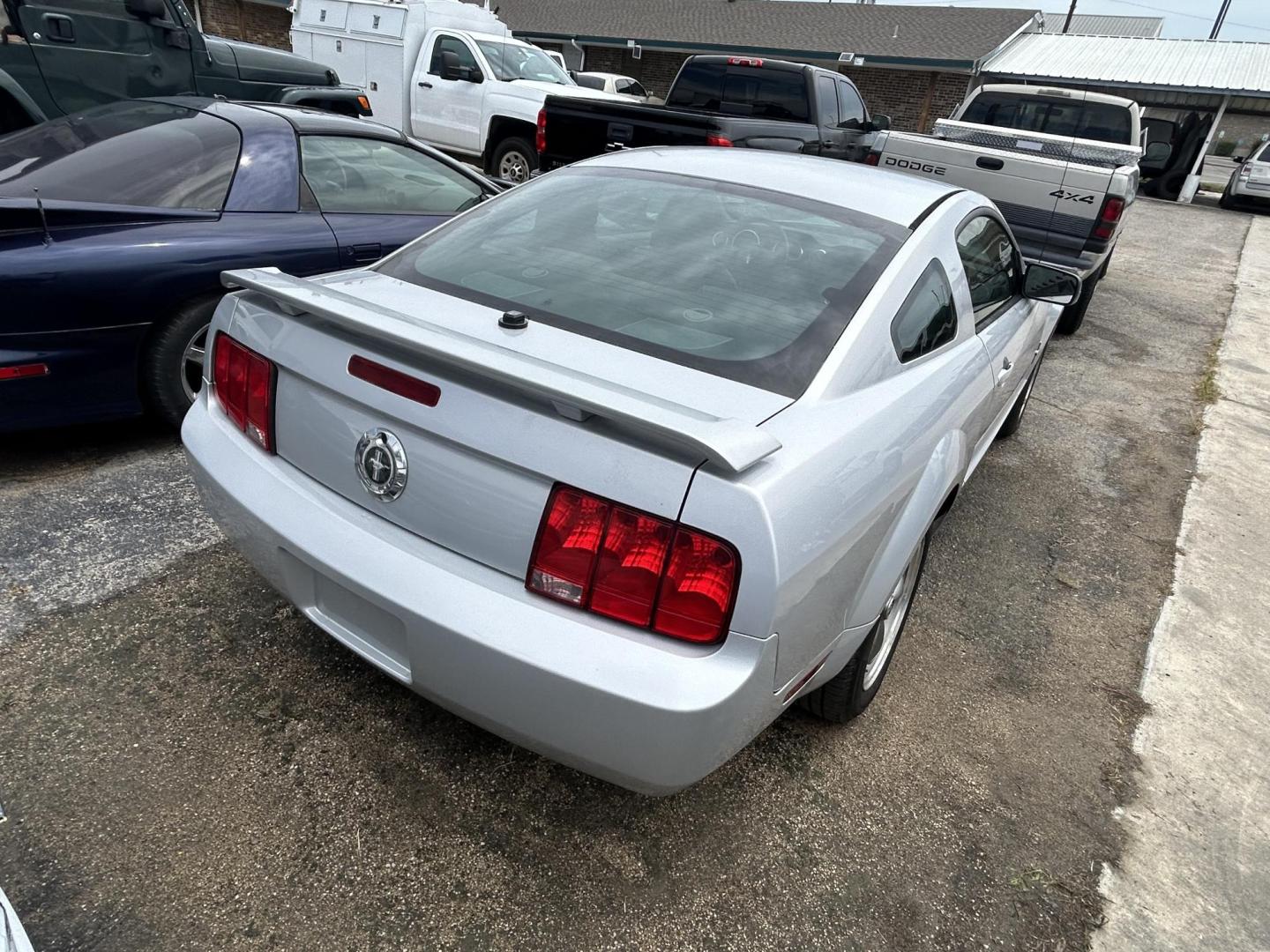 2006 Silver Ford Mustang V6 Deluxe Coupe (1ZVFT80N765) with an 4.0L V6 SOHC 12V engine, located at 1687 Business 35 S, New Braunfels, TX, 78130, (830) 625-7159, 29.655487, -98.051491 - Photo#2