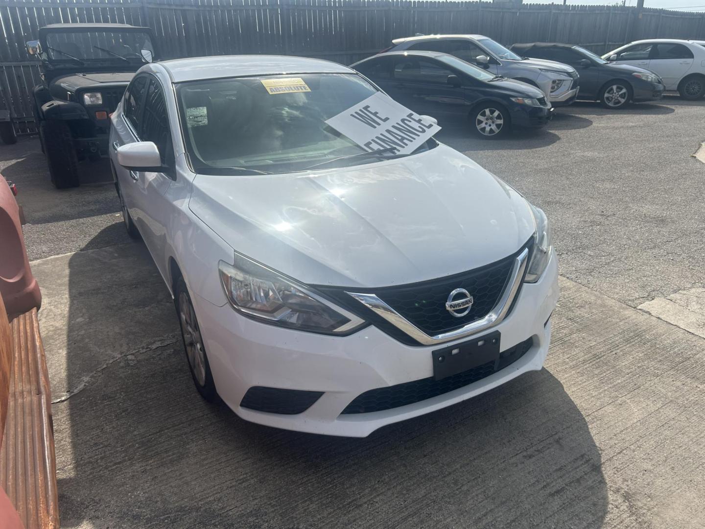 2019 White Nissan Sentra S CVT (3N1AB7AP0KY) with an 1.8L L4 SFI DOHC 16V engine, CVT transmission, located at 1687 Business 35 S, New Braunfels, TX, 78130, (830) 625-7159, 29.655487, -98.051491 - Photo#4