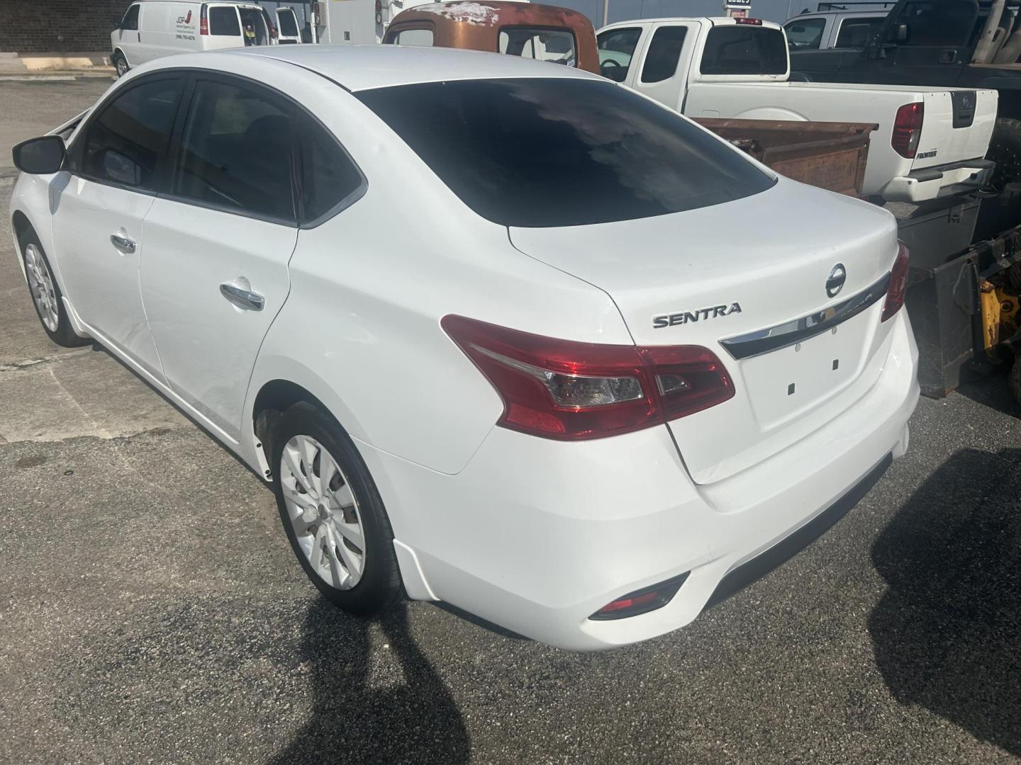 2019 White Nissan Sentra S CVT (3N1AB7AP0KY) with an 1.8L L4 SFI DOHC 16V engine, CVT transmission, located at 1687 Business 35 S, New Braunfels, TX, 78130, (830) 625-7159, 29.655487, -98.051491 - Photo#2