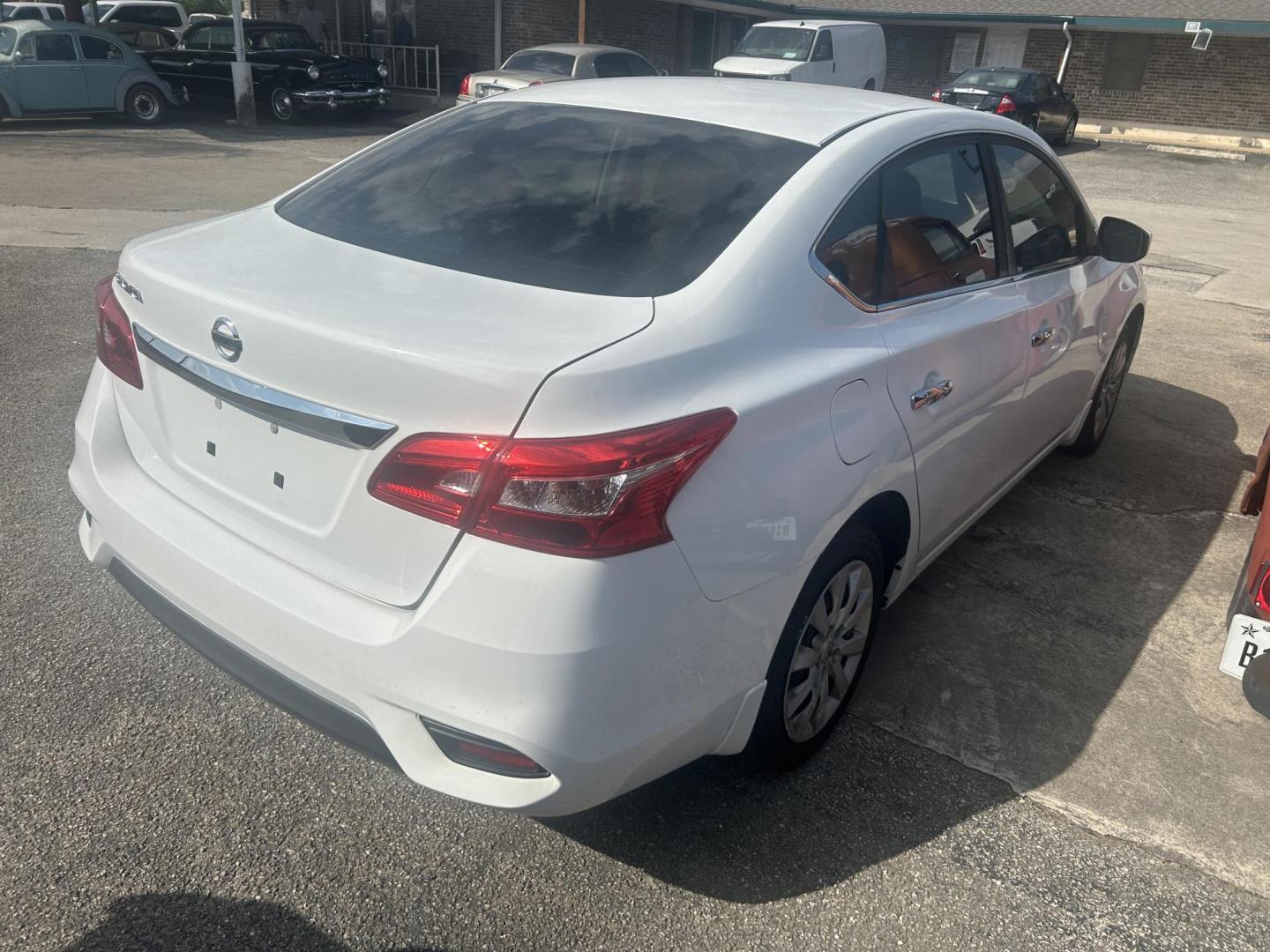 2019 White Nissan Sentra S CVT (3N1AB7AP0KY) with an 1.8L L4 SFI DOHC 16V engine, CVT transmission, located at 1687 Business 35 S, New Braunfels, TX, 78130, (830) 625-7159, 29.655487, -98.051491 - Photo#3
