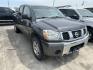 2006 White Nissan Titan LE Crew Cab 2WD (1N6BA07A76N) with an 5.6L V8 DOHC 32V FFV engine, 5-Speed Automatic Overdrive transmission, located at 1687 Business 35 S, New Braunfels, TX, 78130, (830) 625-7159, 29.655487, -98.051491 - Photo#1