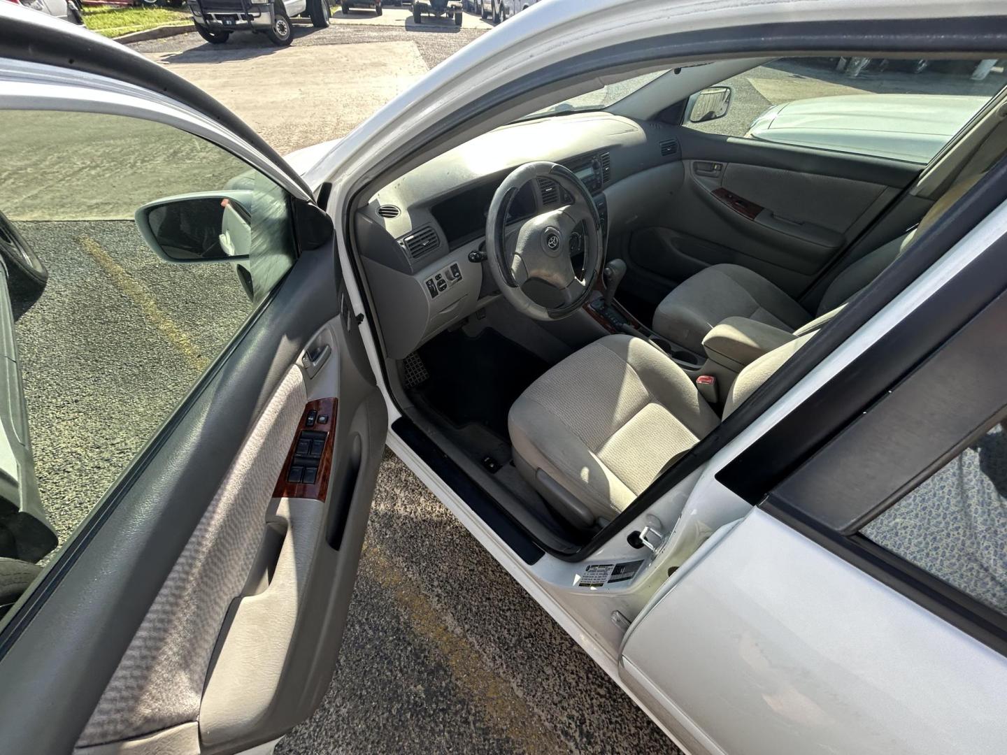 2006 White Toyota Corolla CE (2T1BR32E76C) with an 1.8L L4 DOHC 16V engine, located at 1687 Business 35 S, New Braunfels, TX, 78130, (830) 625-7159, 29.655487, -98.051491 - Photo#9