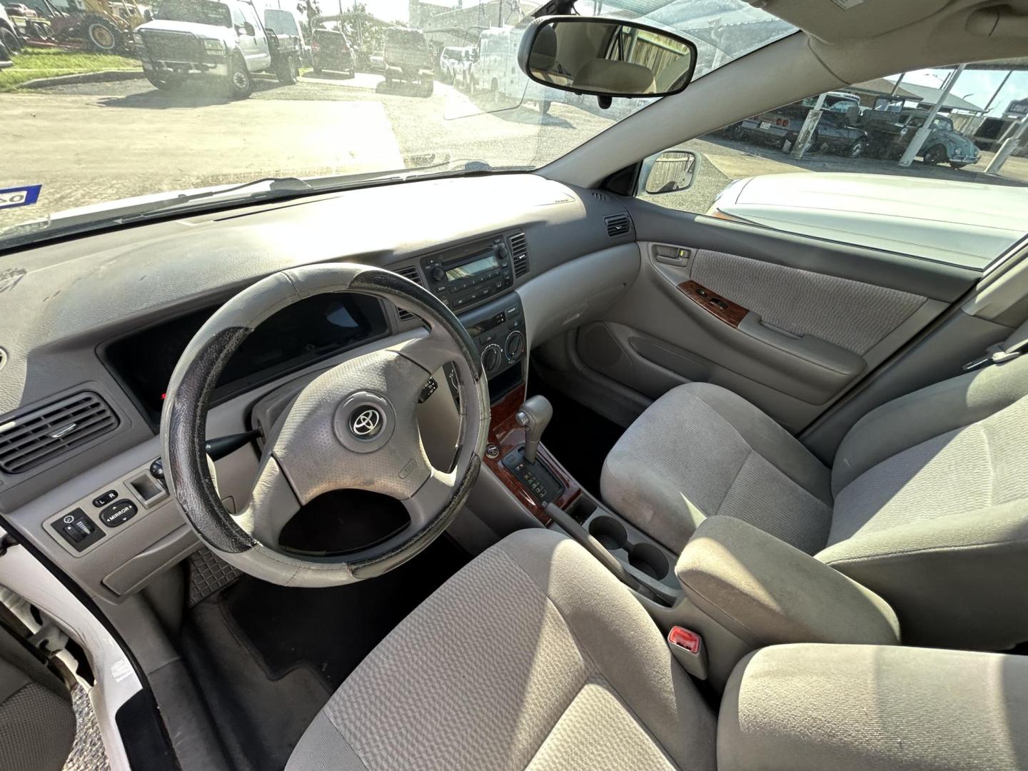 2006 White Toyota Corolla CE (2T1BR32E76C) with an 1.8L L4 DOHC 16V engine, located at 1687 Business 35 S, New Braunfels, TX, 78130, (830) 625-7159, 29.655487, -98.051491 - Photo#11