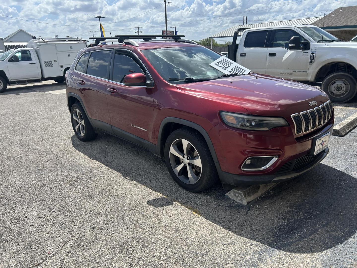 2019 Red Jeep Cherokee Limited FWD (1C4PJLDN9KD) with an 2.0L L4 DOHC 16V TURBO engine, 9A transmission, located at 1687 Business 35 S, New Braunfels, TX, 78130, (830) 625-7159, 29.655487, -98.051491 - Photo#1