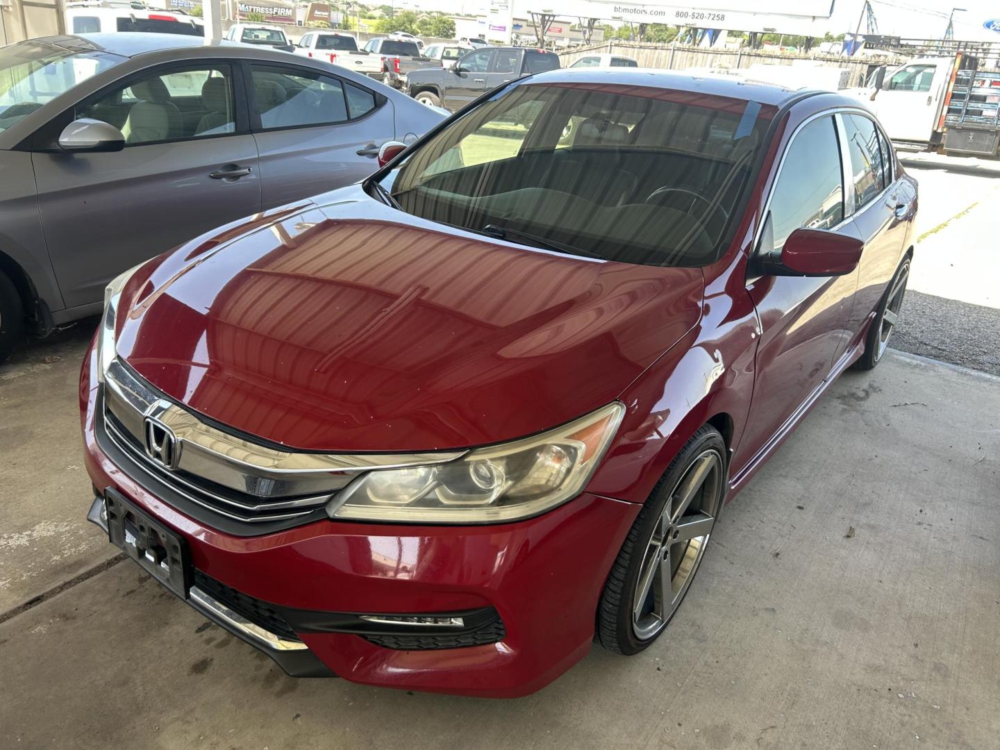 2017 Red Honda Accord Sport Sedan CVT (1HGCR2F50HA) with an 2.4L L4 DOHC 16V engine, CVT transmission, located at 1687 Business 35 S, New Braunfels, TX, 78130, (830) 625-7159, 29.655487, -98.051491 - Photo#0
