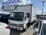 2004 White GMC W45042 - (J8DC4B14847) with an 4.75L L4 TURBO-INTERCOOLER DIESEL engine, located at 1687 Business 35 S, New Braunfels, TX, 78130, (830) 625-7159, 29.655487, -98.051491 - Photo#0