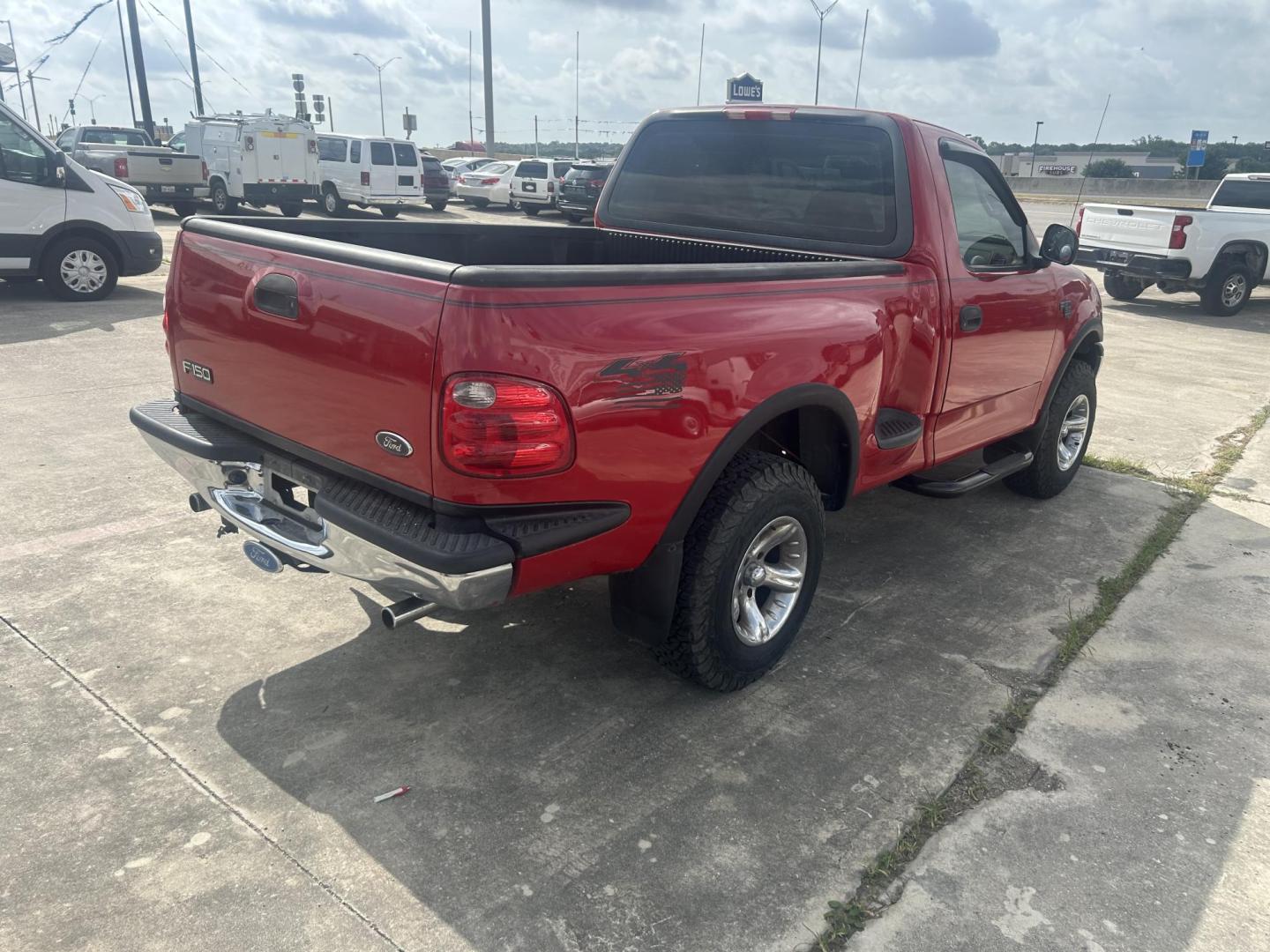 2001 Red Ford F-150 XL Flareside 4WD (1FTRF08W01K) with an 4.6L V8 SOHC 16V engine, located at 1687 Business 35 S, New Braunfels, TX, 78130, (830) 625-7159, 29.655487, -98.051491 - Photo#4