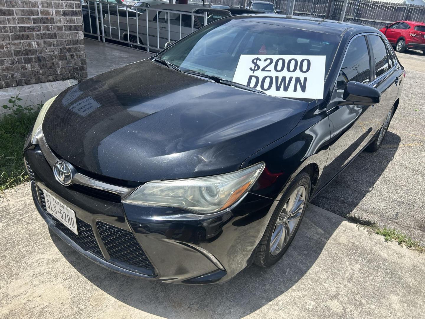 2016 Black Toyota Camry SE (4T1BF1FK6GU) with an 2.5L L4 DOHC 16V engine, 6-Speed Automatic transmission, located at 1687 Business 35 S, New Braunfels, TX, 78130, (830) 625-7159, 29.655487, -98.051491 - Photo#0